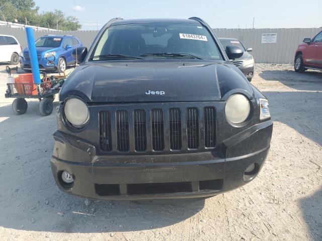 Photo 4 VIN: 1J4NF4FB5AD584789 - JEEP COMPASS 