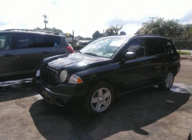 Photo 1 VIN: 1J4NF4FB6AD513052 - JEEP COMPASS 