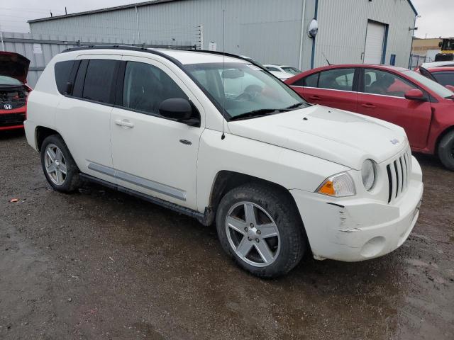 Photo 3 VIN: 1J4NF4FB7AD552958 - JEEP COMPASS 