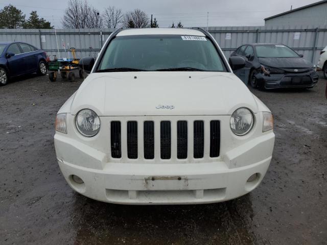 Photo 4 VIN: 1J4NF4FB7AD552958 - JEEP COMPASS 