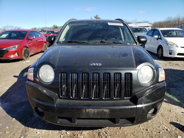 Photo 4 VIN: 1J4NF4FBXAD557457 - JEEP COMPASS 