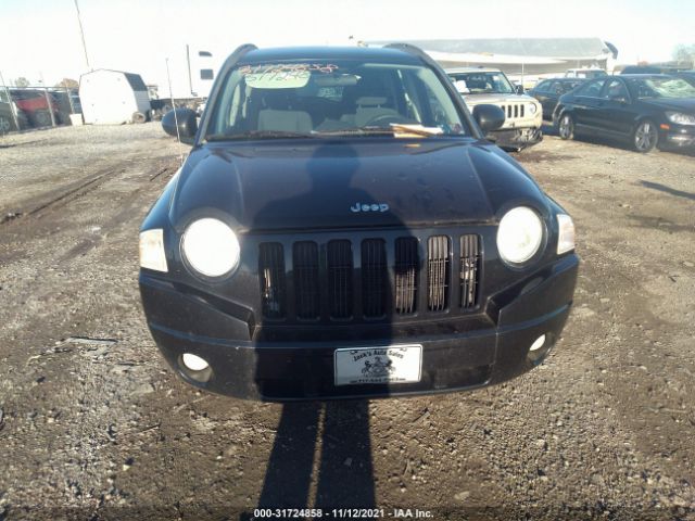 Photo 5 VIN: 1J4NF4FBXAD574632 - JEEP COMPASS 