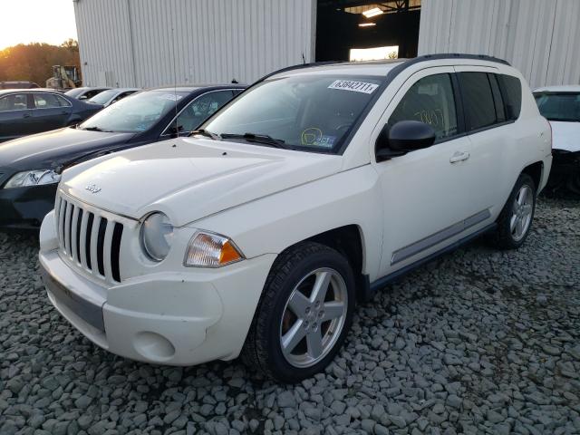 Photo 1 VIN: 1J4NF5FB1AD622380 - JEEP COMPASS LI 