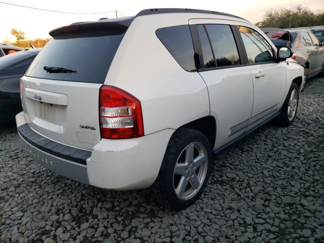 Photo 3 VIN: 1J4NF5FB1AD622380 - JEEP COMPASS LI 