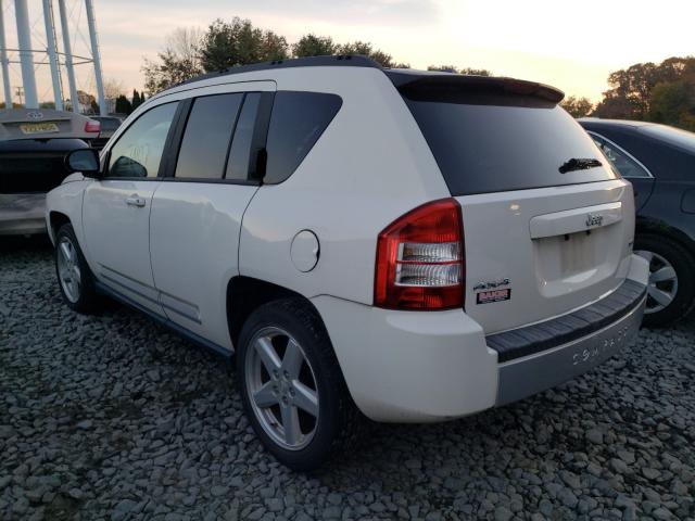 Photo 8 VIN: 1J4NF5FB1AD622380 - JEEP COMPASS LI 