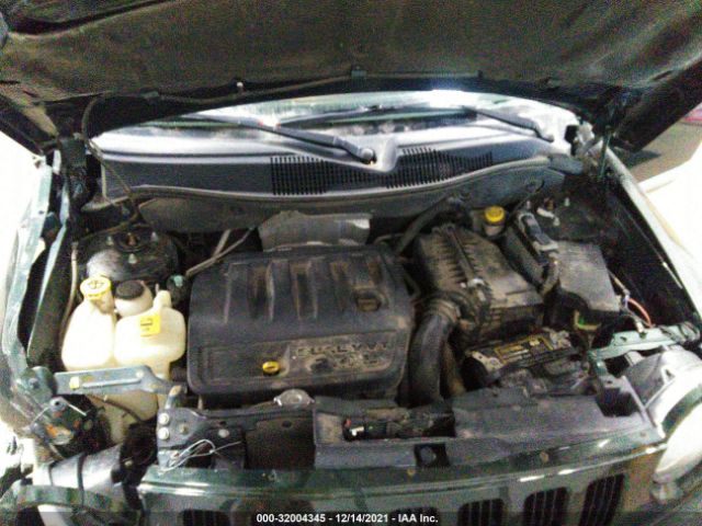 Photo 9 VIN: 1J4NF5FB6AD570079 - JEEP COMPASS 