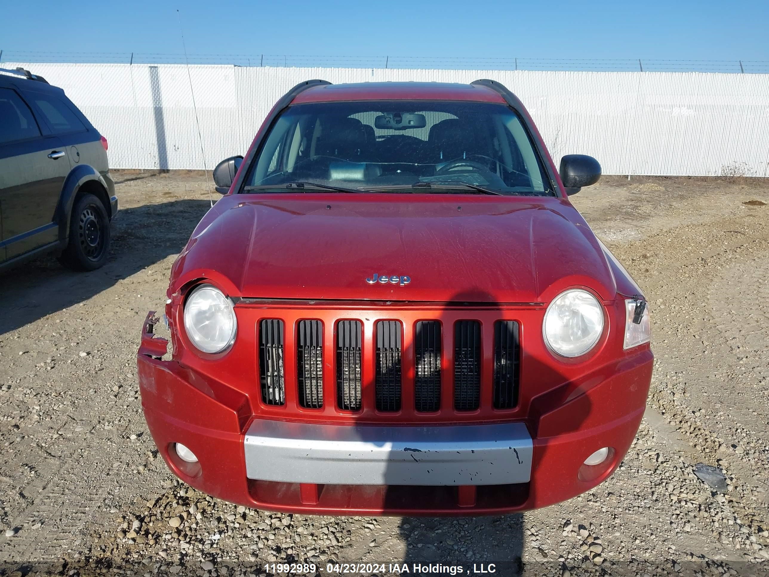 Photo 11 VIN: 1J4NF5FB6AD585049 - JEEP COMPASS 