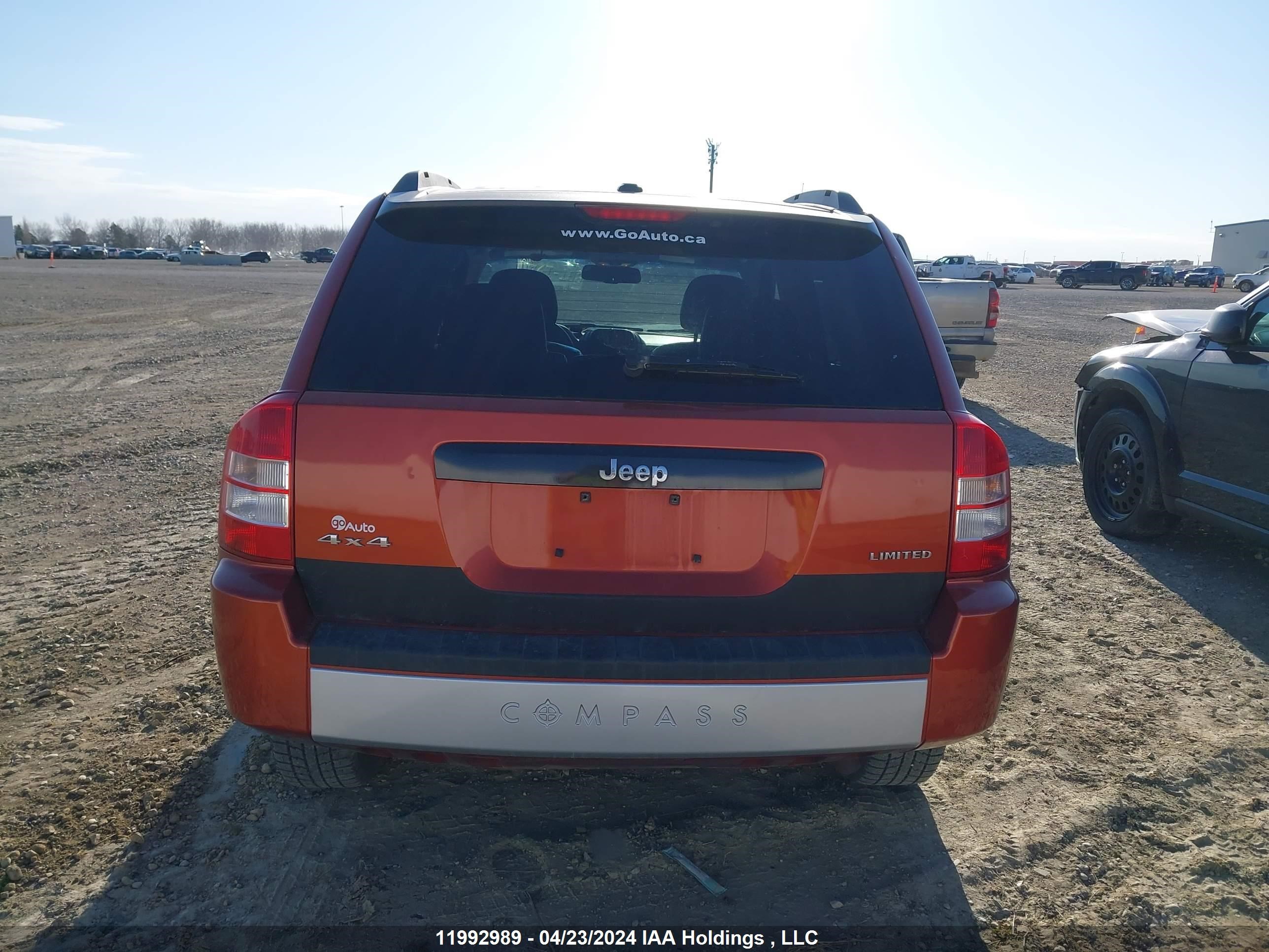 Photo 15 VIN: 1J4NF5FB6AD585049 - JEEP COMPASS 