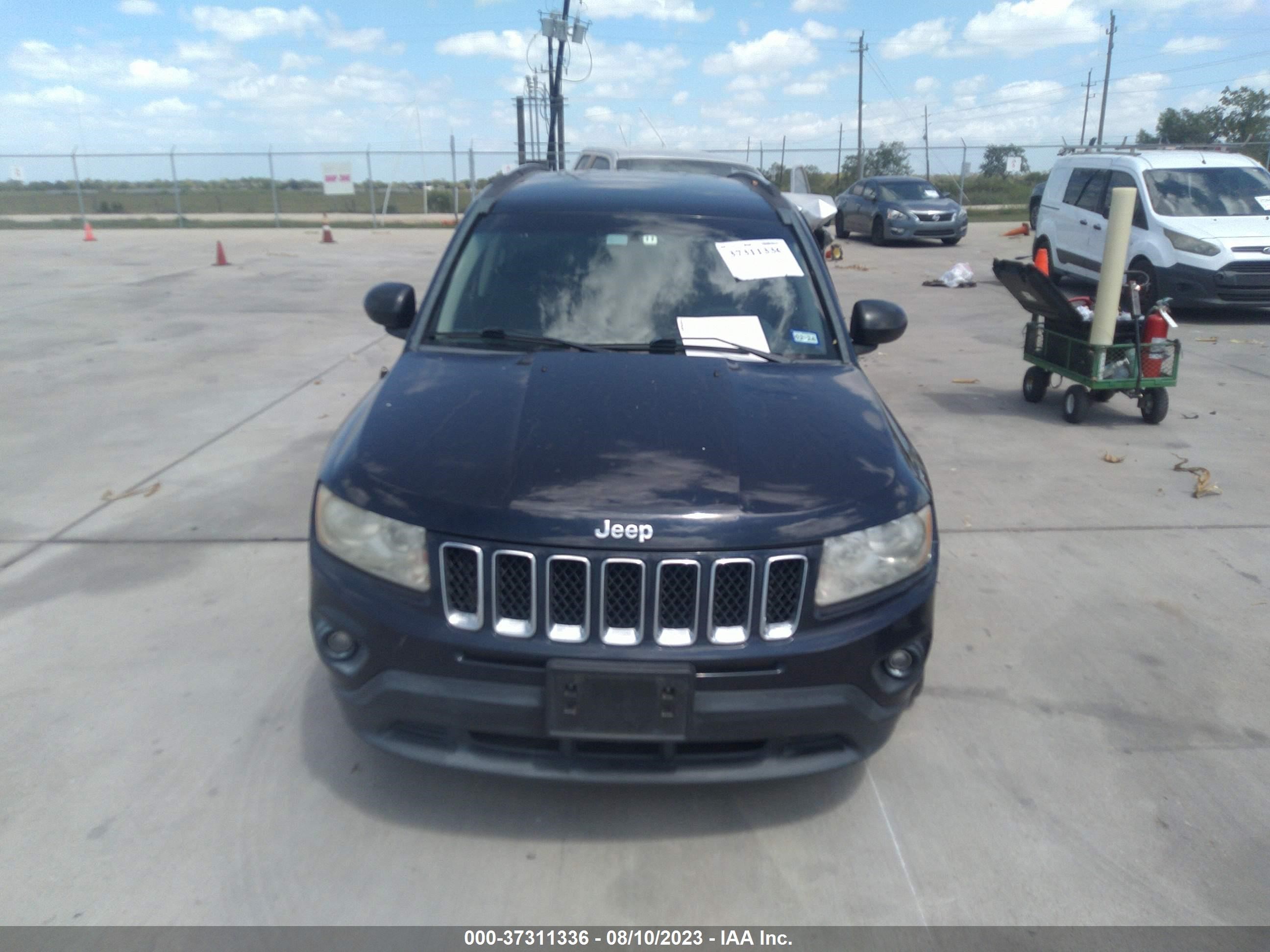 Photo 11 VIN: 1J4NT1FB0BD159649 - JEEP COMPASS 