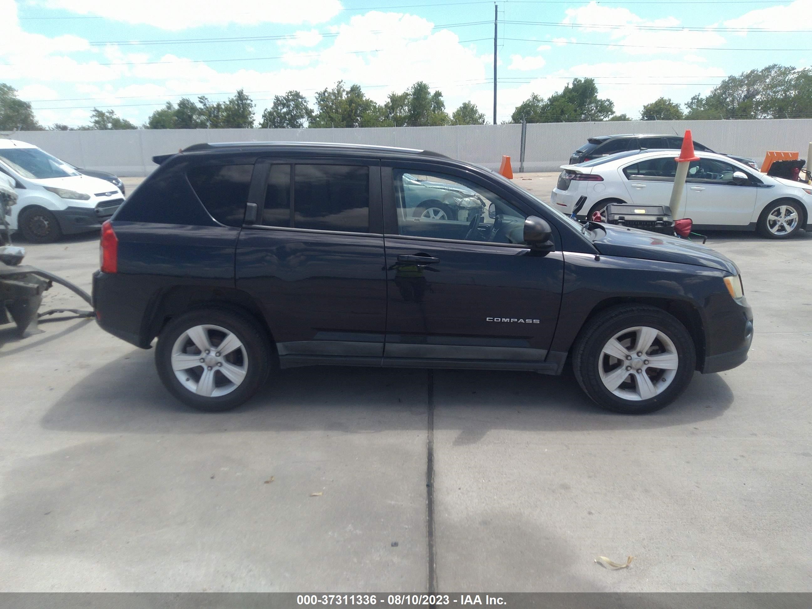 Photo 12 VIN: 1J4NT1FB0BD159649 - JEEP COMPASS 