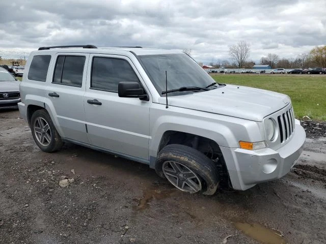 Photo 3 VIN: 1J4NT2GB4AD501428 - JEEP PATRIOT SP 