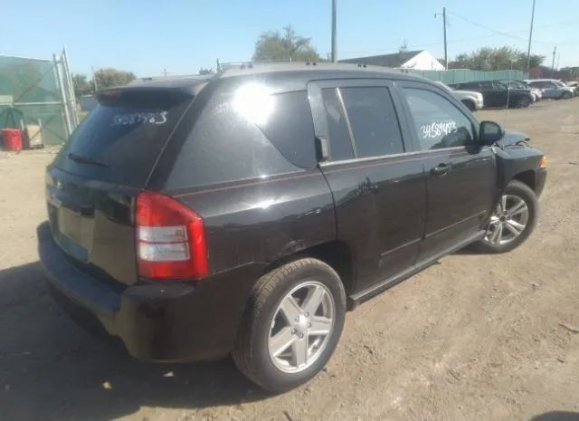 Photo 3 VIN: 1J4NT4FA1AD523486 - JEEP COMPASS 