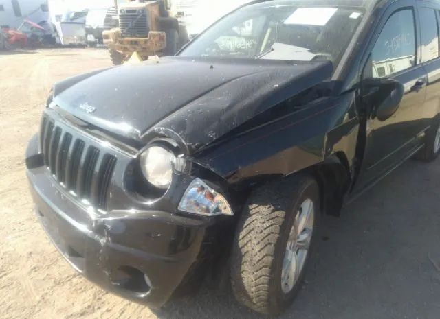 Photo 5 VIN: 1J4NT4FA1AD523486 - JEEP COMPASS 