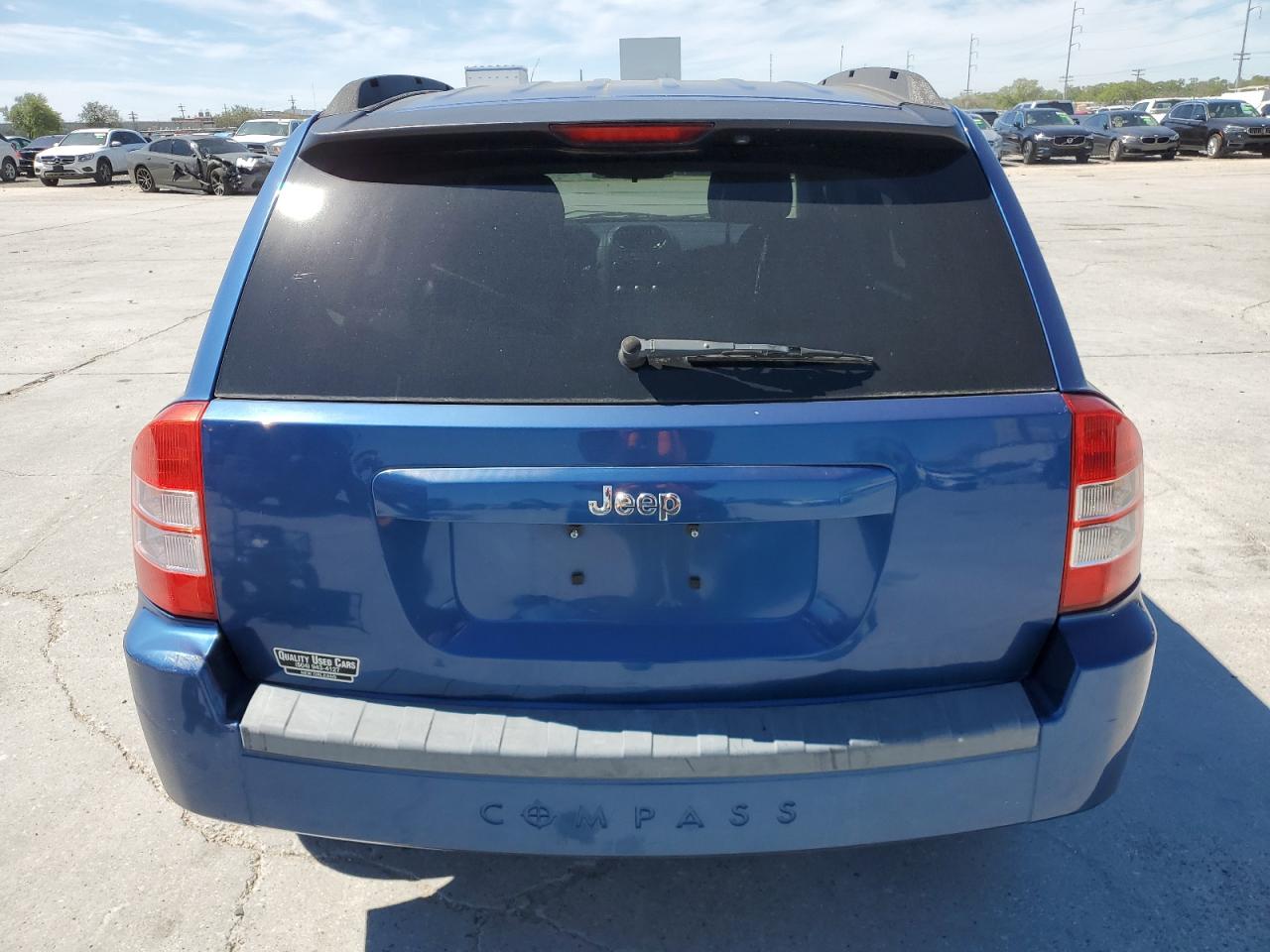 Photo 5 VIN: 1J4NT4FA9AD502921 - JEEP COMPASS 