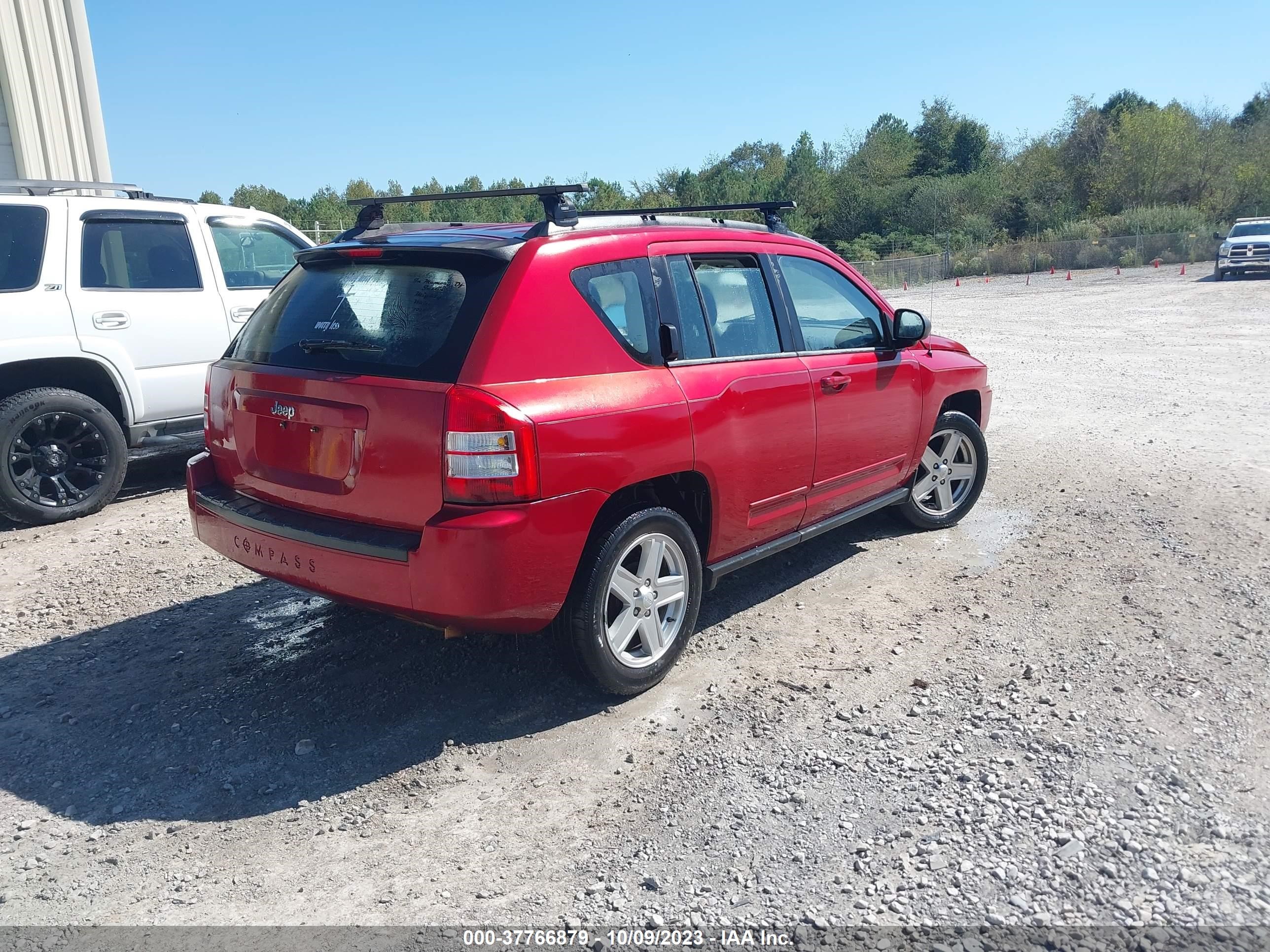 Photo 3 VIN: 1J4NT4FB3AD561097 - JEEP COMPASS 