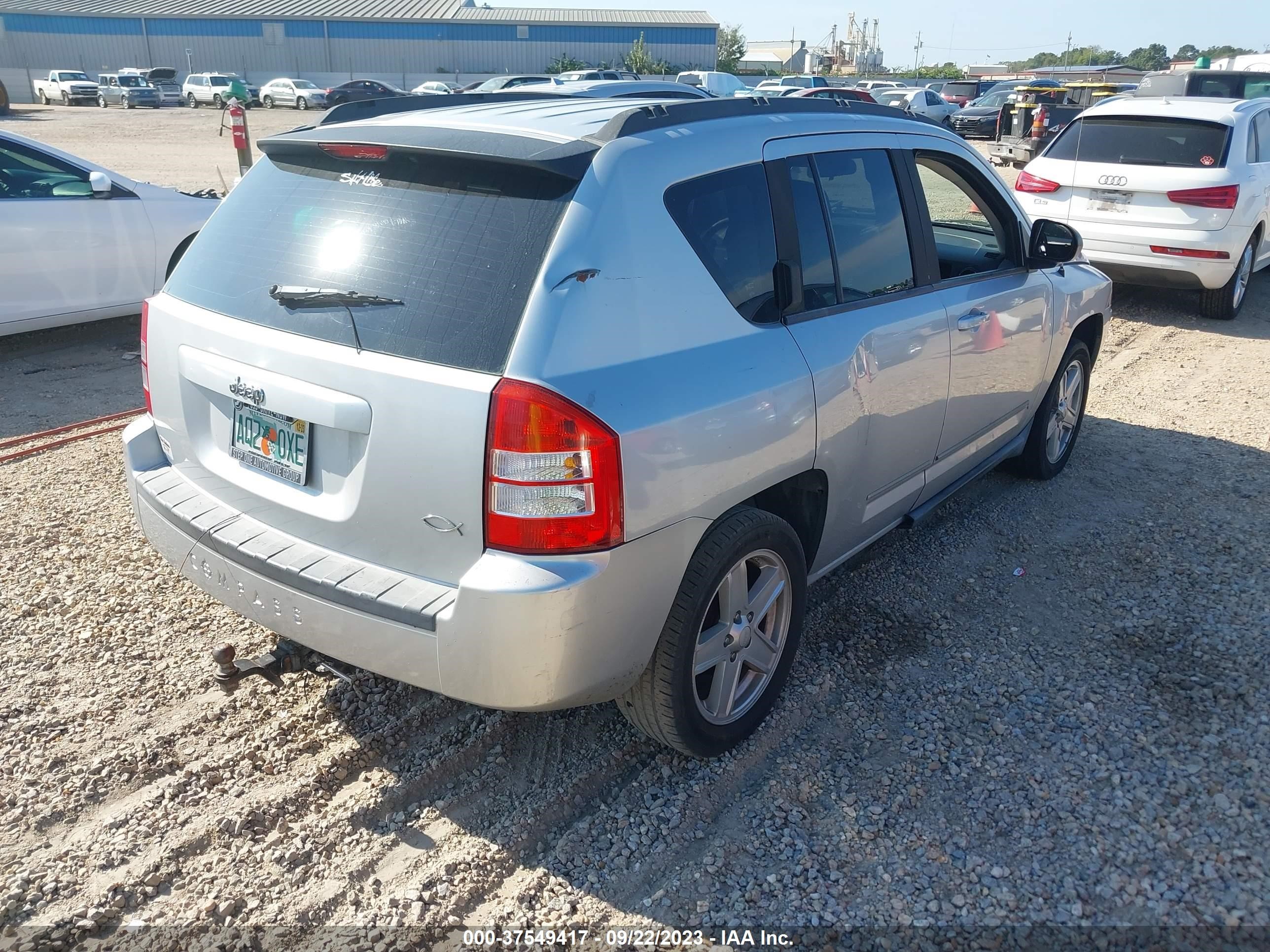 Photo 3 VIN: 1J4NT4FB3AD561102 - JEEP COMPASS 