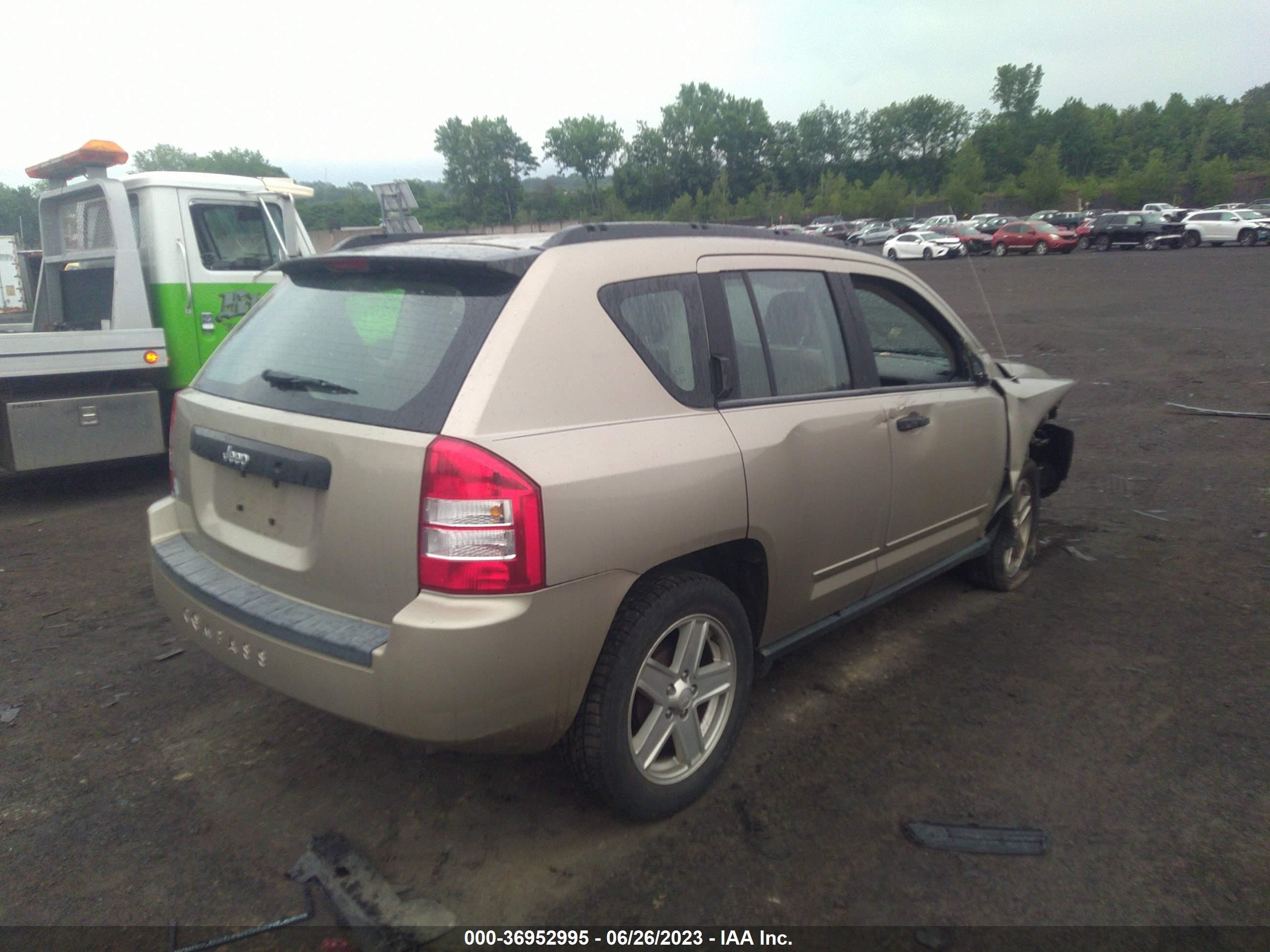 Photo 3 VIN: 1J4NT4FB9AD515970 - JEEP COMPASS 