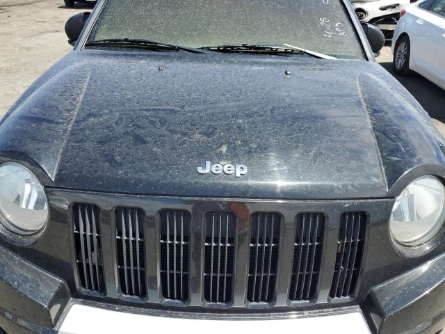 Photo 10 VIN: 1J4NT5FB3AD515761 - JEEP COMPASS 