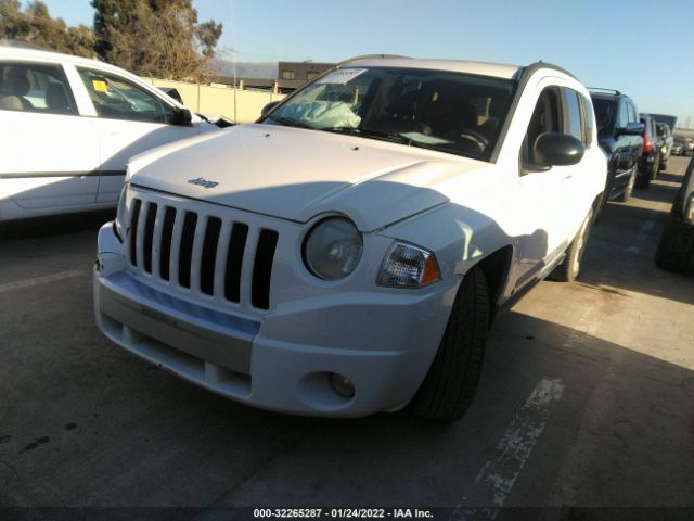 Photo 1 VIN: 1J4NT5FBXAD640885 - JEEP COMPASS 