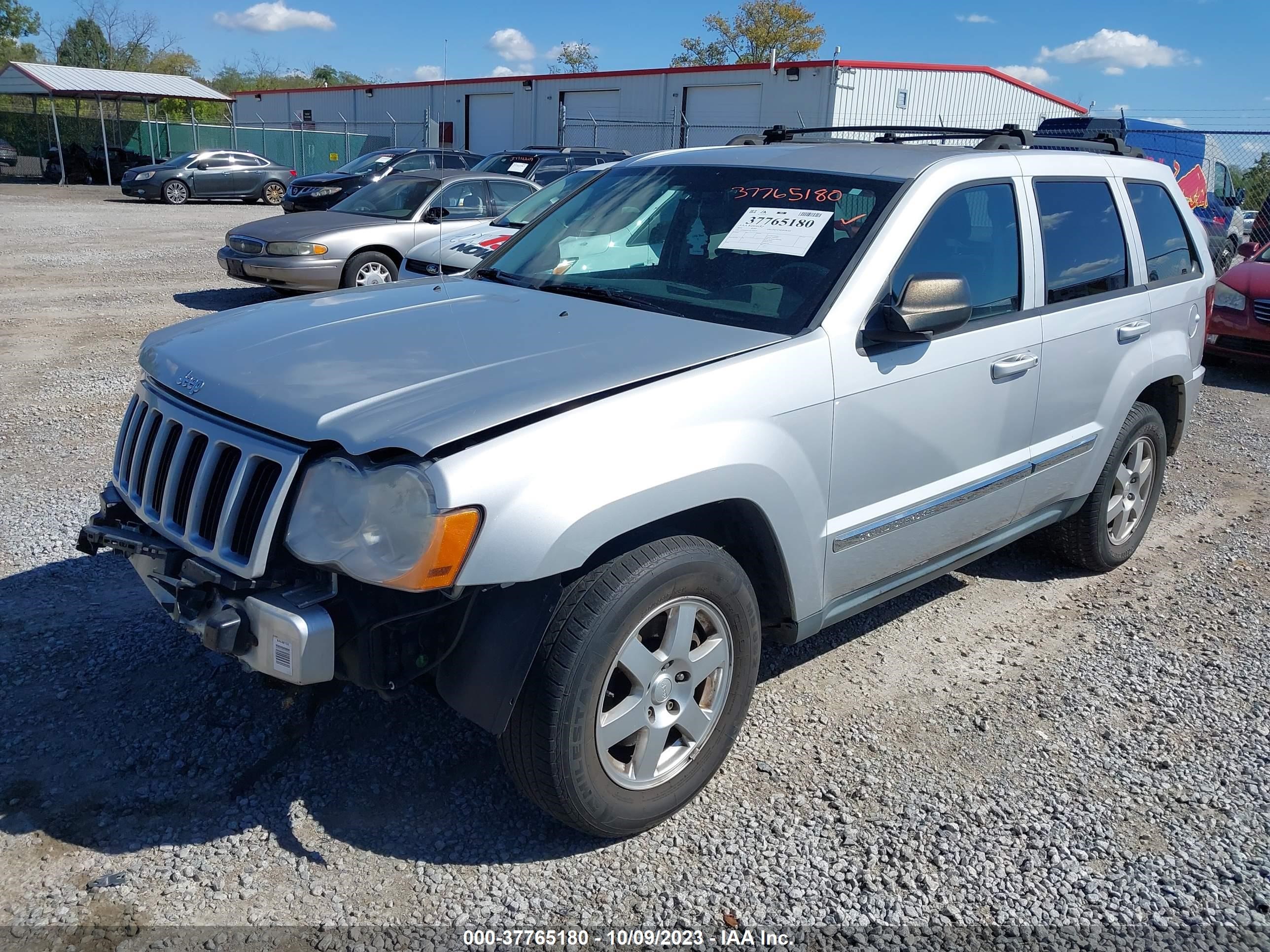 Photo 1 VIN: 1J4PR4GK5AC100477 - JEEP GRAND CHEROKEE 