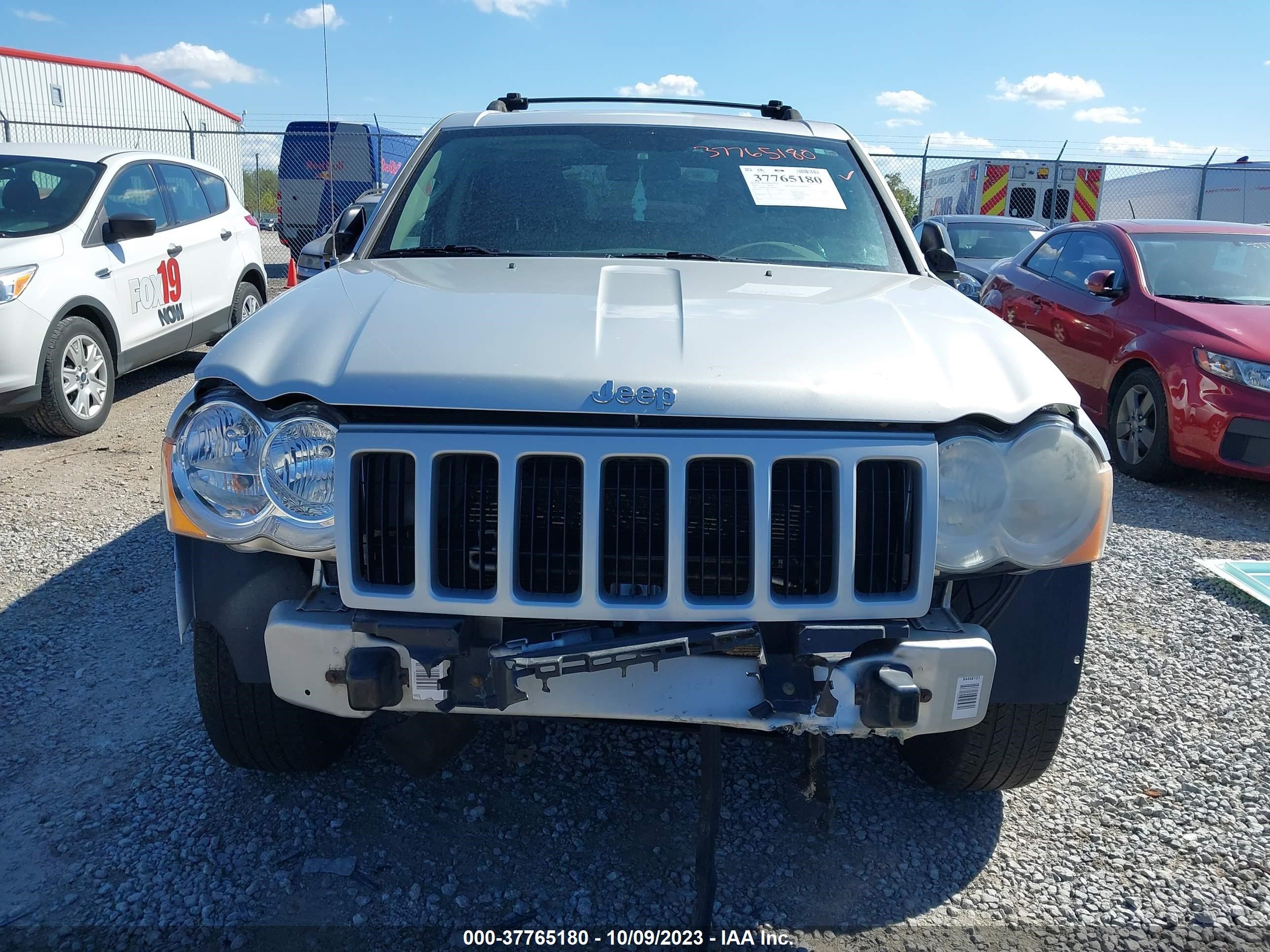 Photo 12 VIN: 1J4PR4GK5AC100477 - JEEP GRAND CHEROKEE 