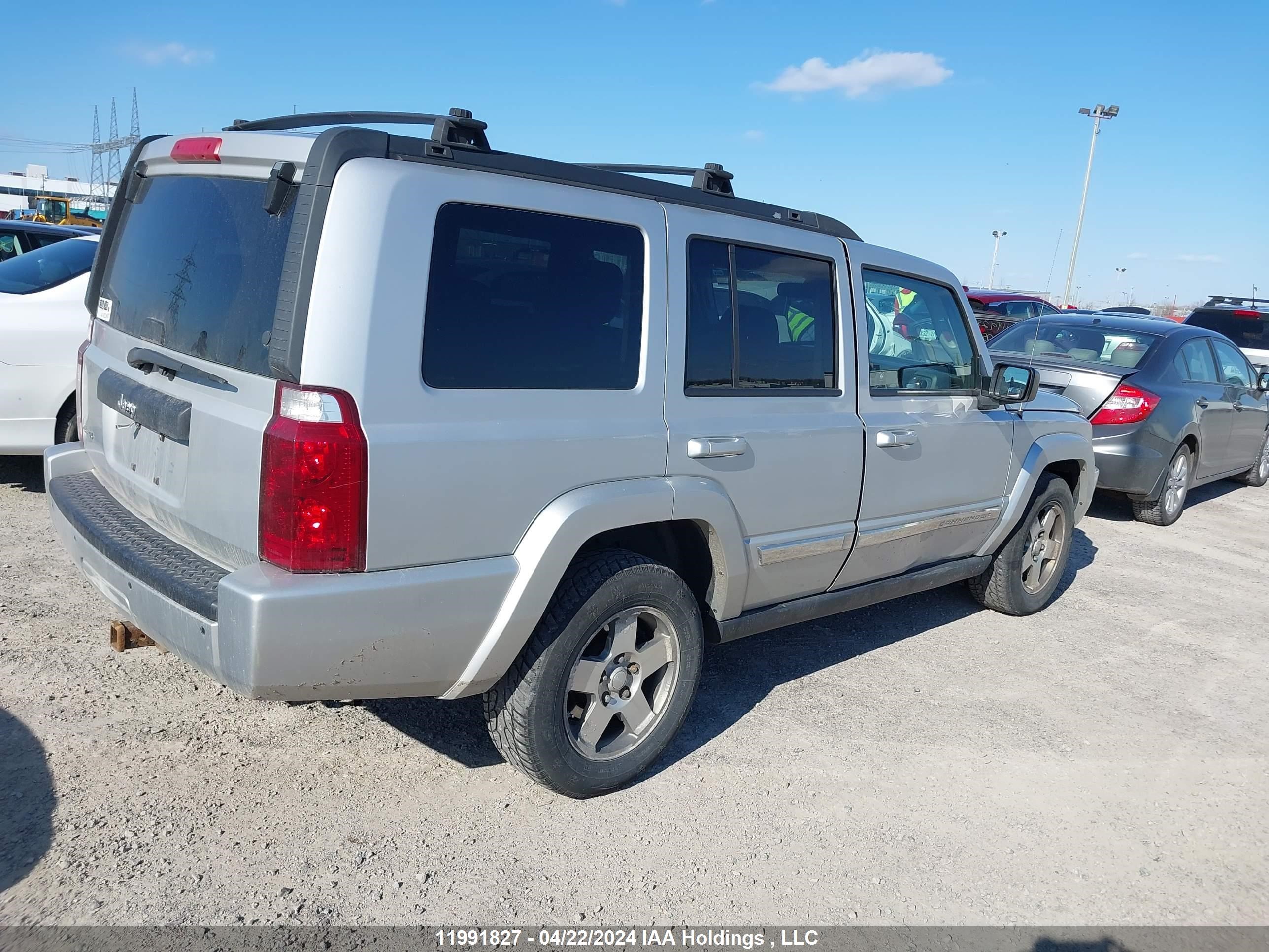 Photo 3 VIN: 1J4RG4GKXAC104426 - JEEP COMMANDER 