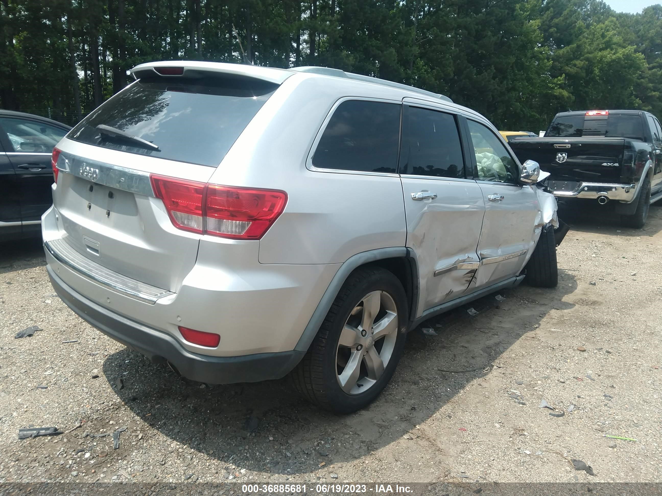 Photo 3 VIN: 1J4RS6GT3BC658928 - JEEP GRAND CHEROKEE 