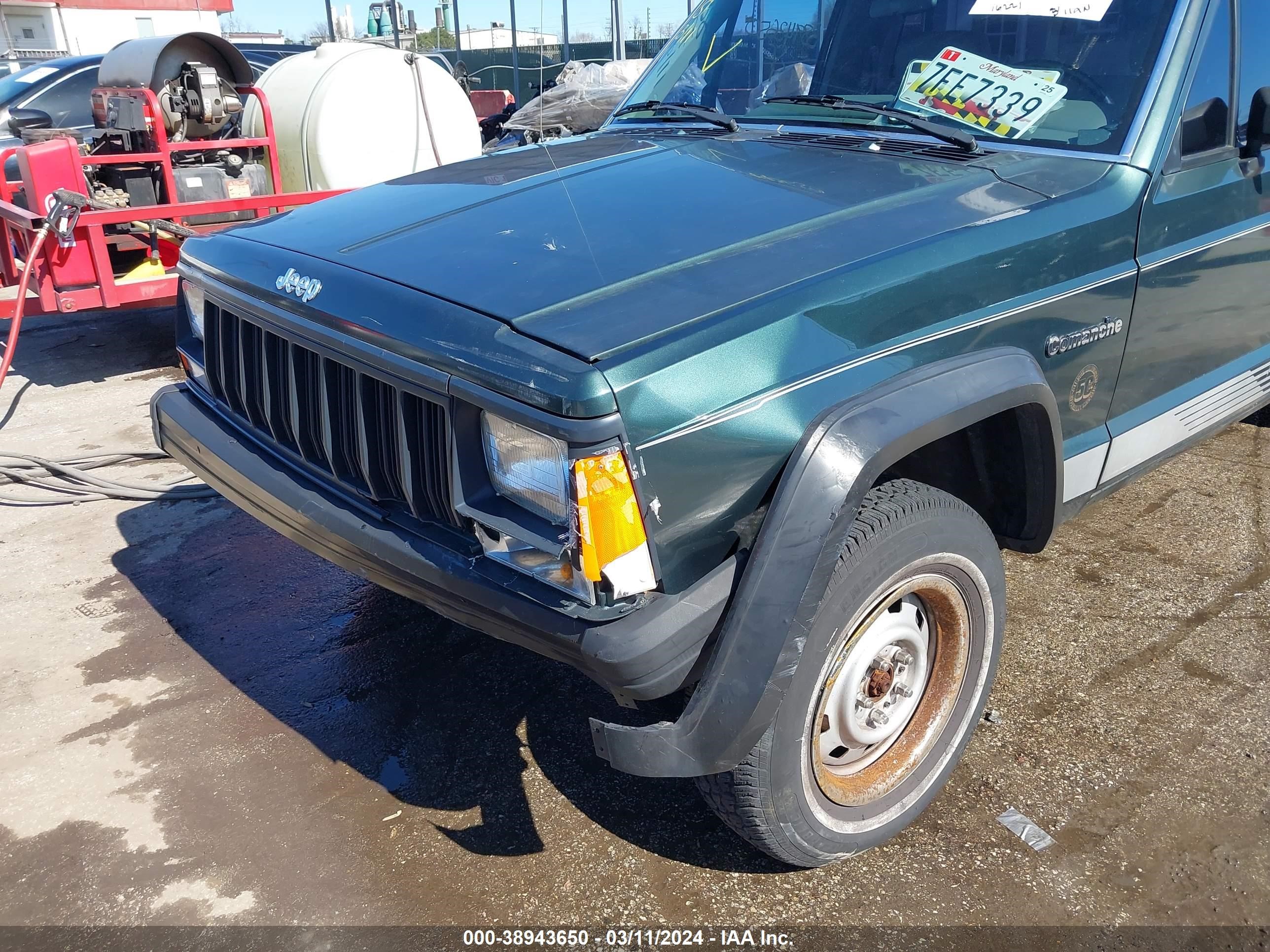 Photo 16 VIN: 1J7FJ26S6ML583980 - JEEP NULL 