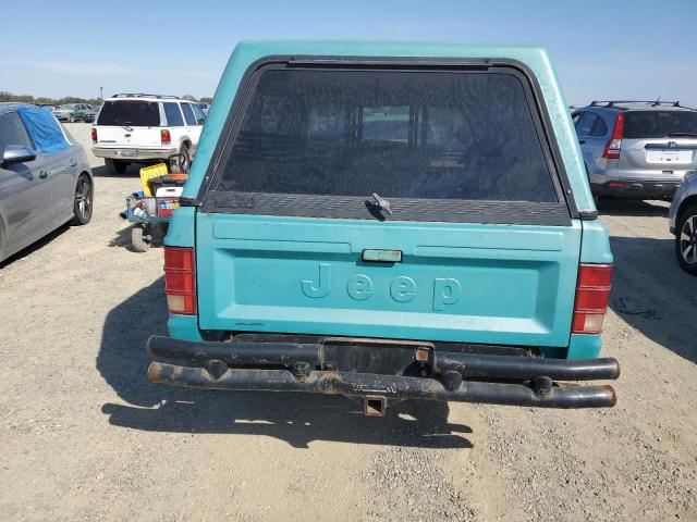 Photo 5 VIN: 1J7FJ36L4KL402709 - JEEP COMANCHE P 