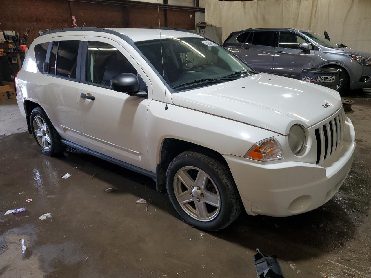 Photo 3 VIN: 1J8FF47B49D137240 - JEEP COMPASS 