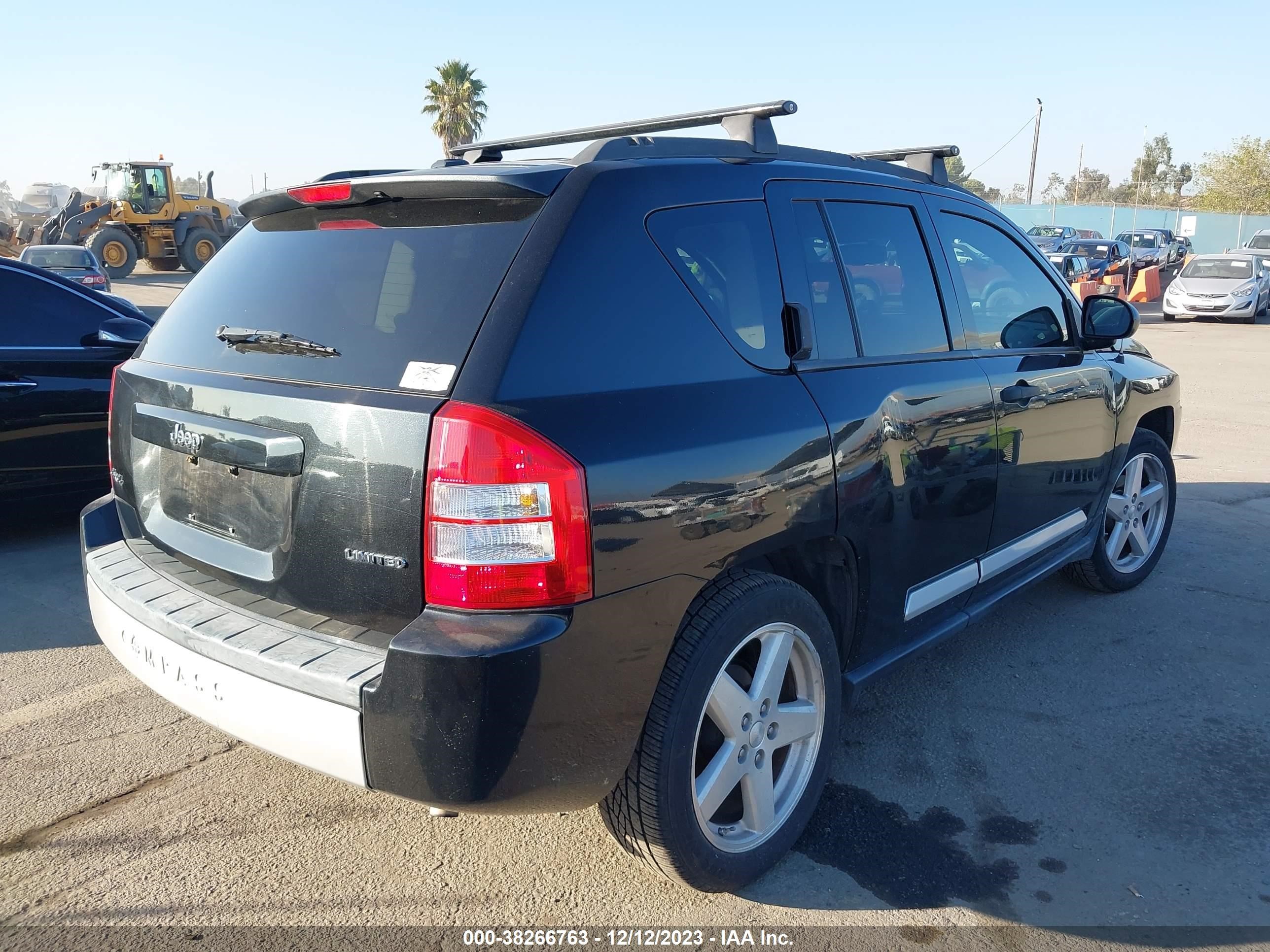 Photo 3 VIN: 1J8FF57B39D133542 - JEEP COMPASS 