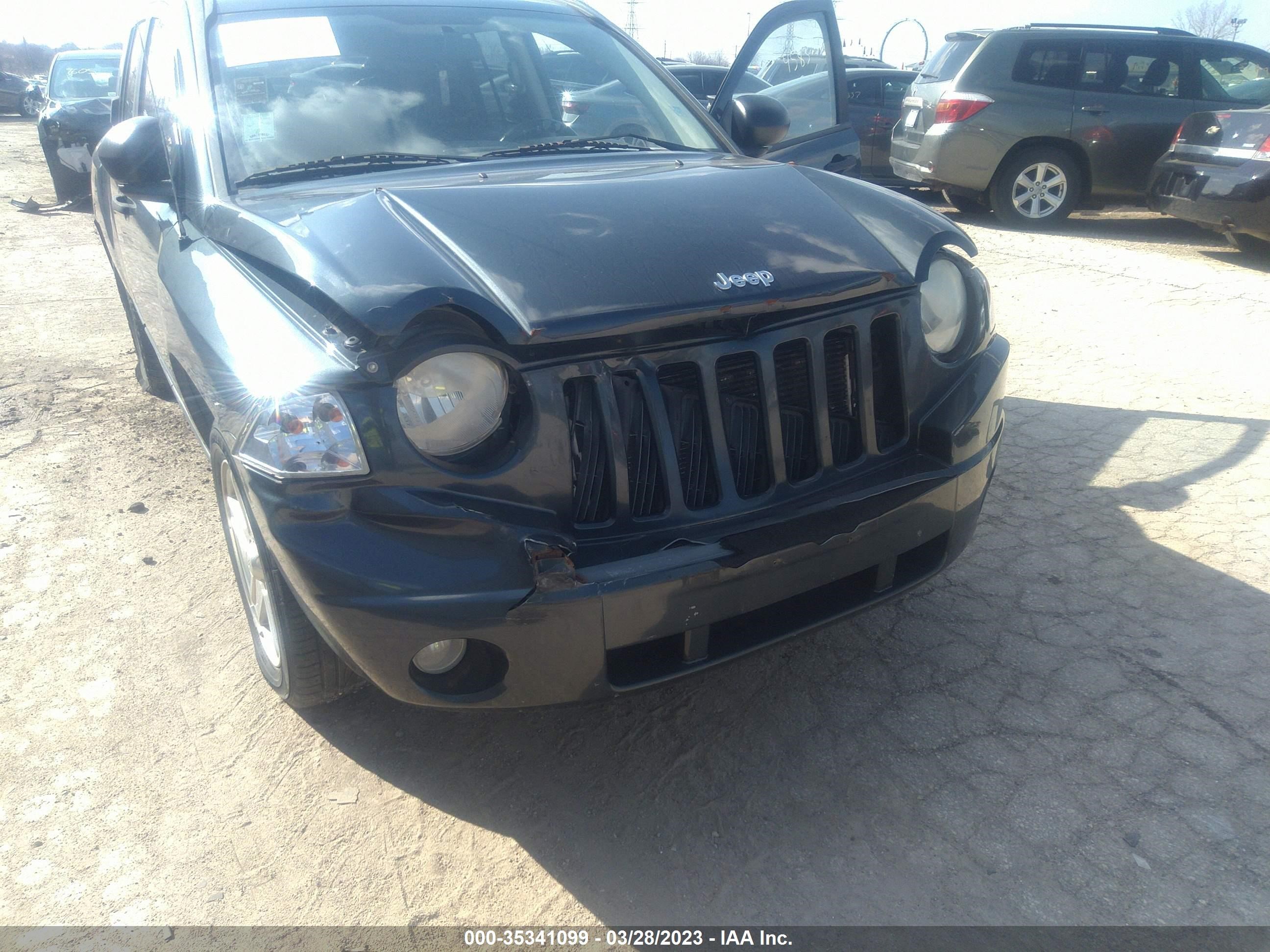 Photo 5 VIN: 1J8FT47068D750062 - JEEP COMPASS 