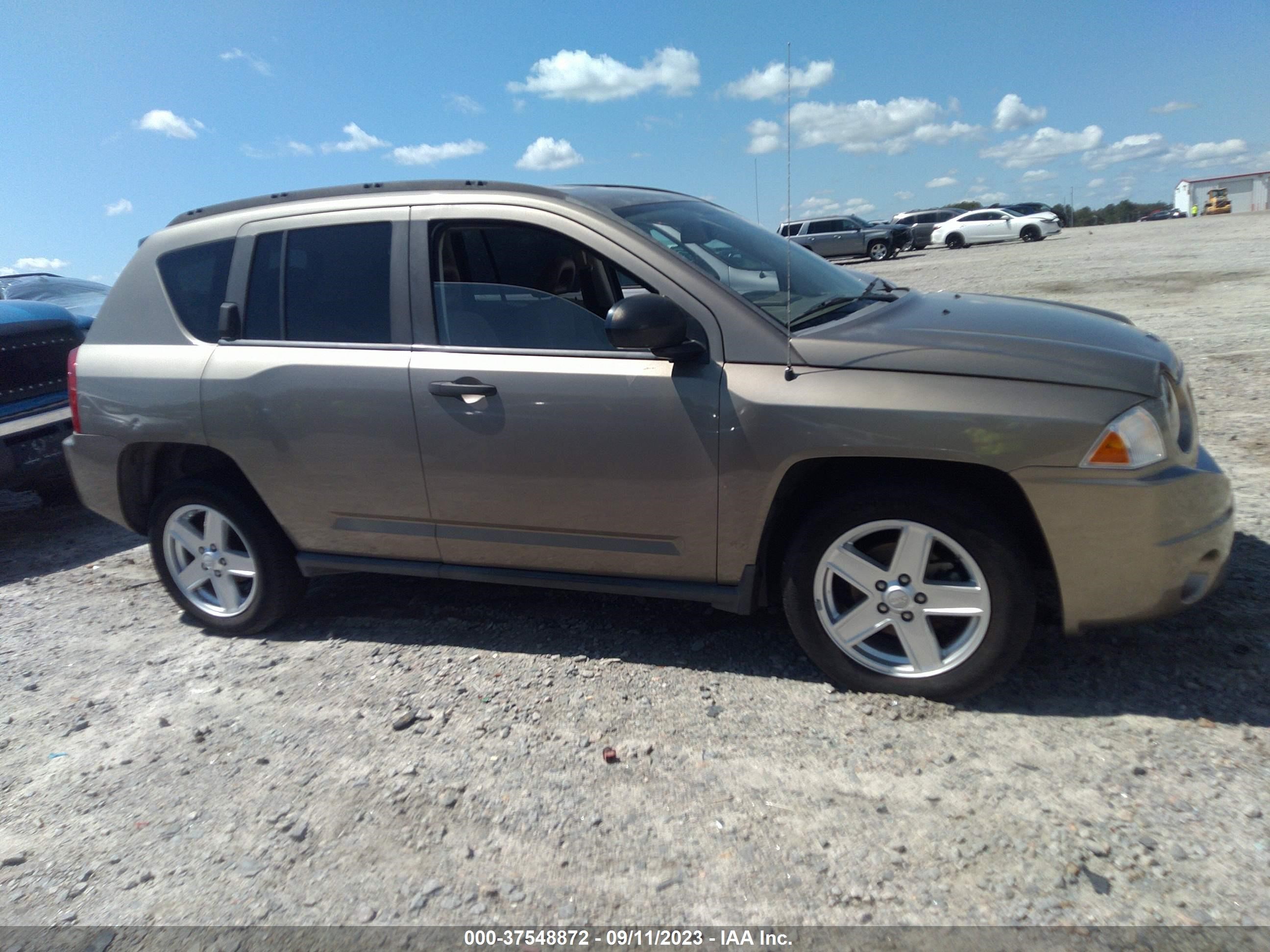 Photo 12 VIN: 1J8FT47W77D189938 - JEEP COMPASS 