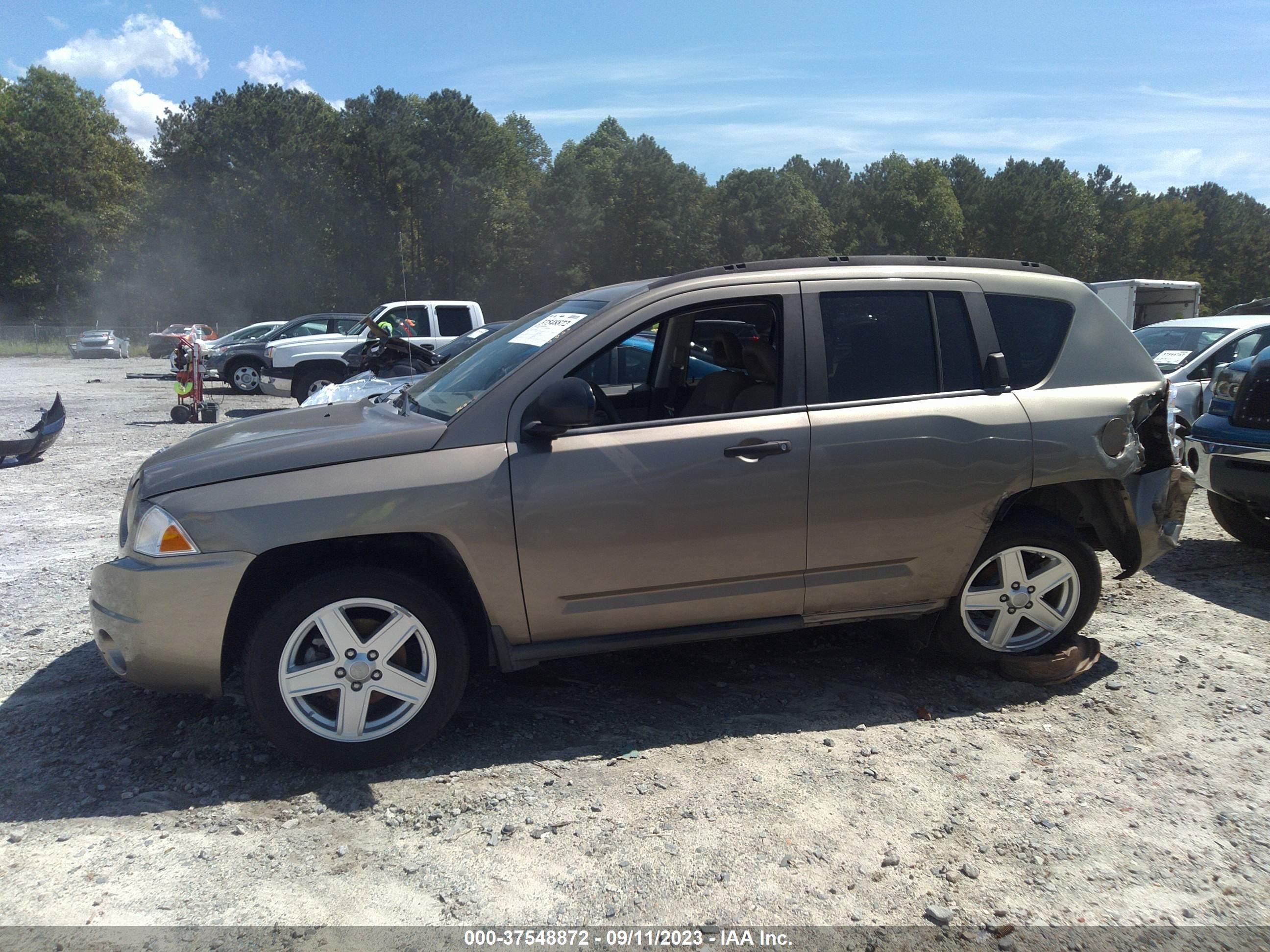 Photo 13 VIN: 1J8FT47W77D189938 - JEEP COMPASS 