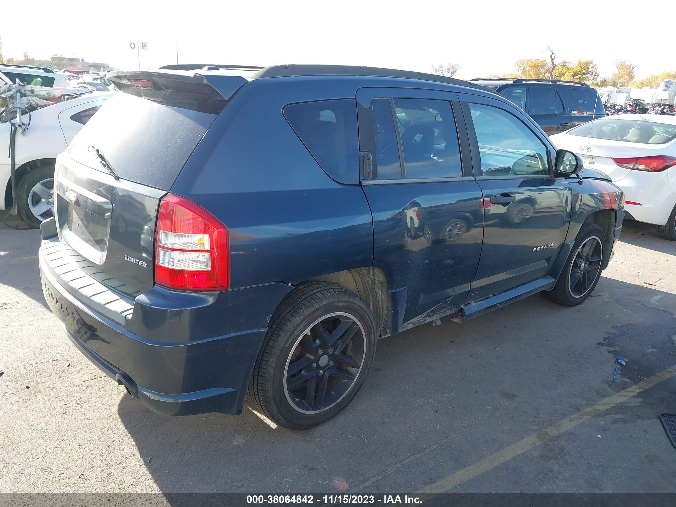 Photo 3 VIN: 1J8FT57W28D580275 - JEEP COMPASS 