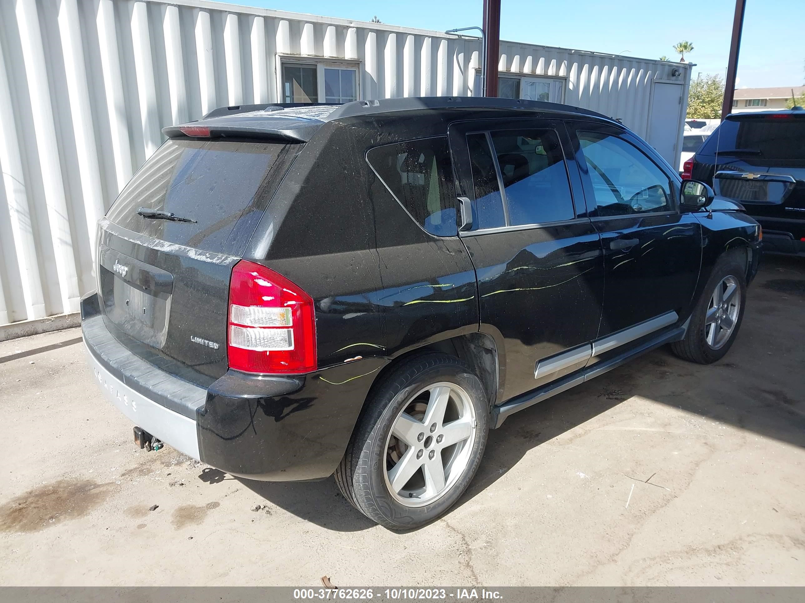 Photo 3 VIN: 1J8FT57W57D261404 - JEEP COMPASS 