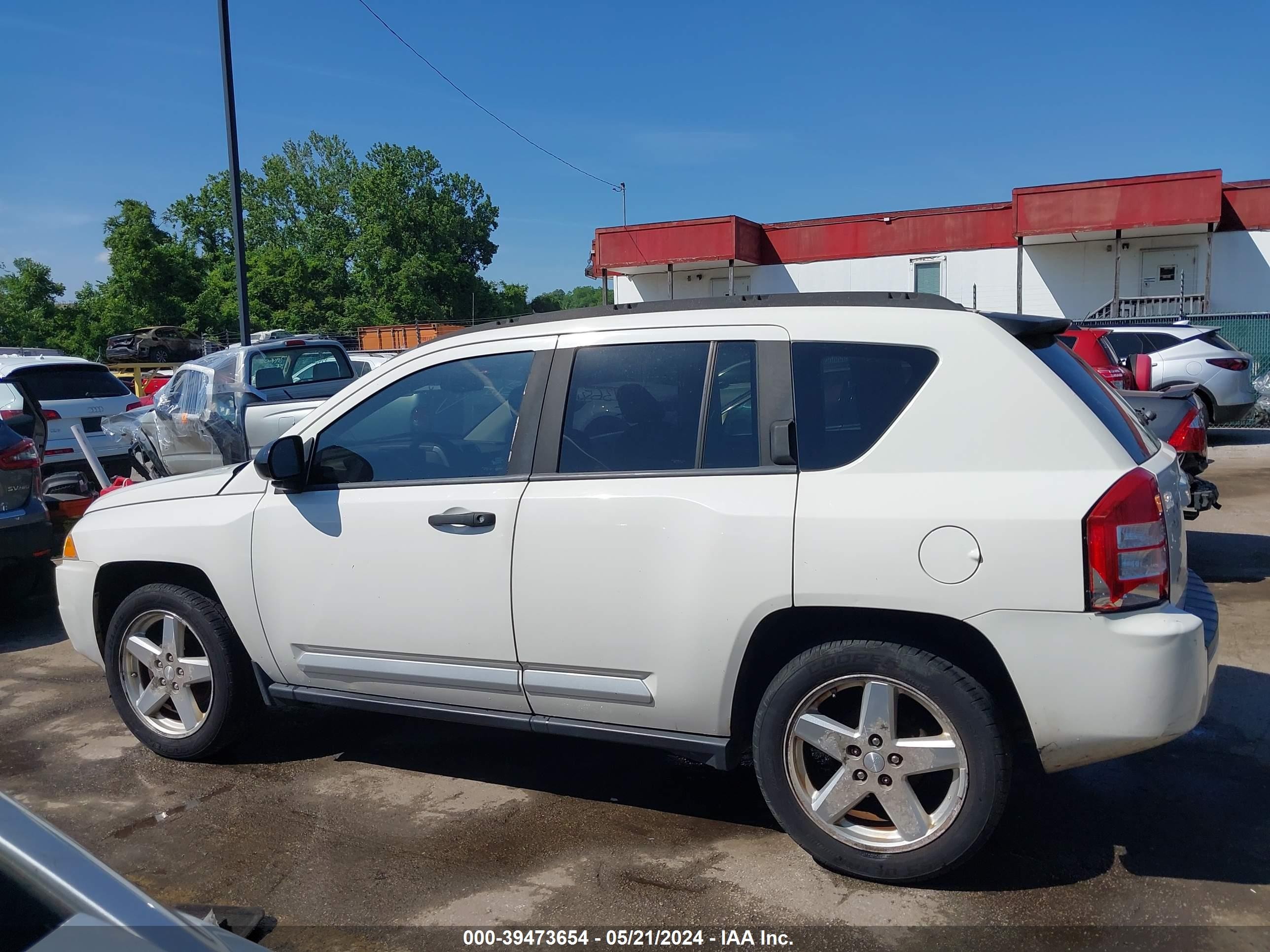 Photo 13 VIN: 1J8FT57W88D663919 - JEEP COMPASS 