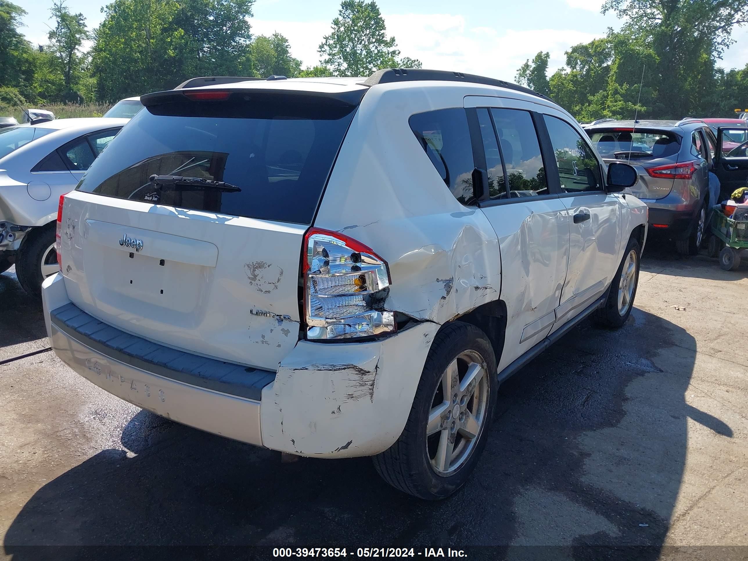 Photo 3 VIN: 1J8FT57W88D663919 - JEEP COMPASS 