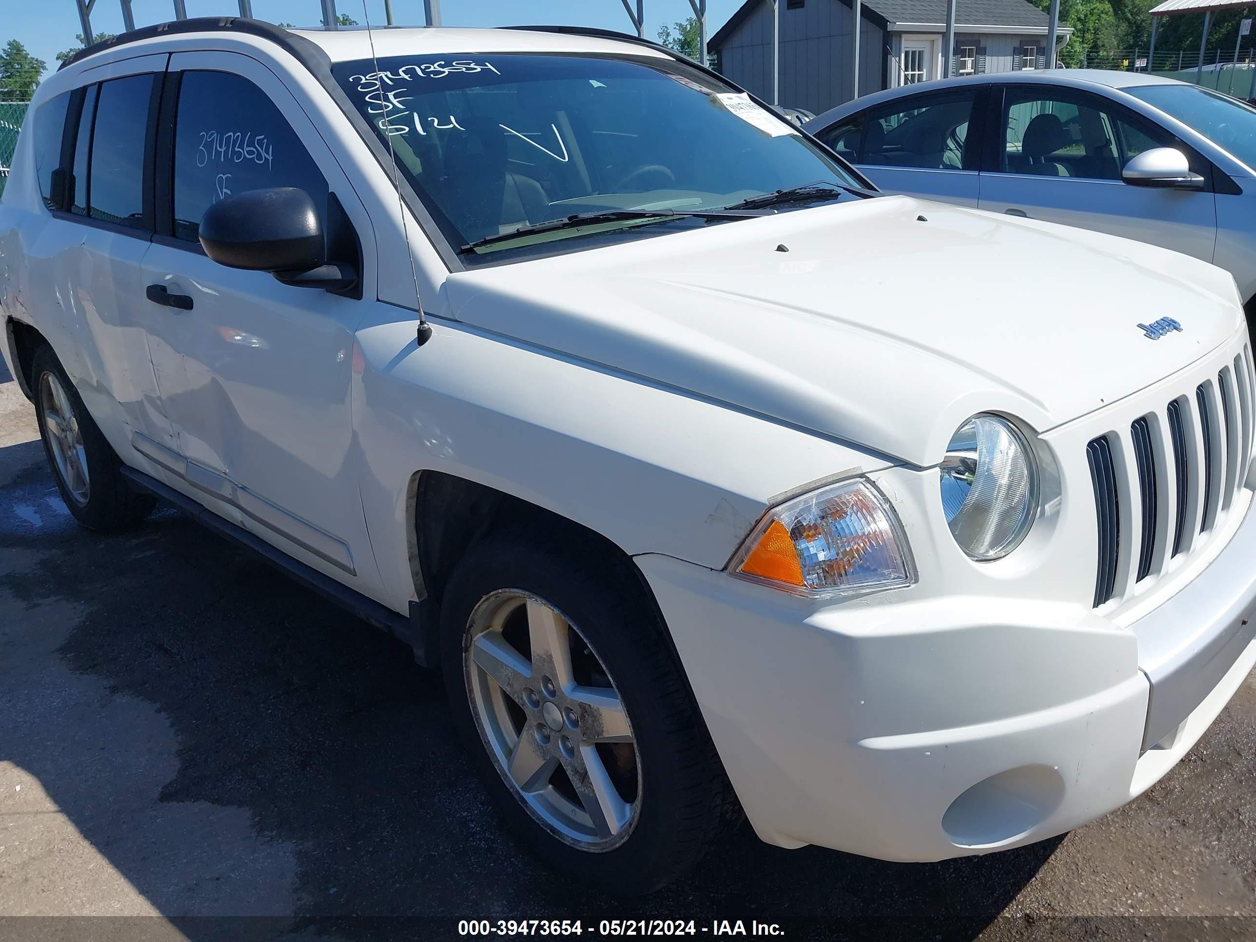 Photo 5 VIN: 1J8FT57W88D663919 - JEEP COMPASS 