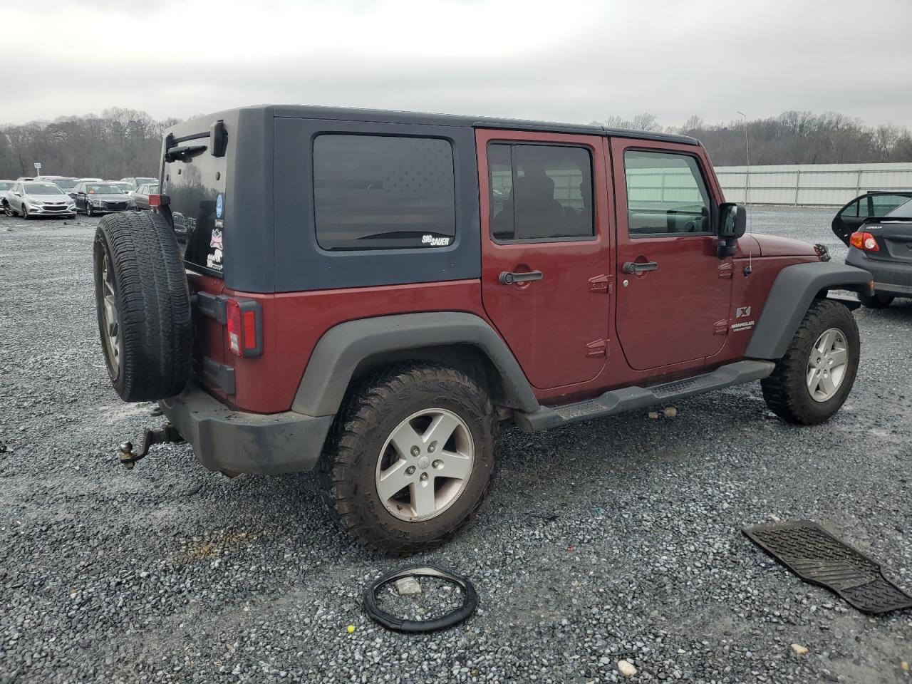 Photo 2 VIN: 1J8GA39109L750608 - JEEP WRANGLER 