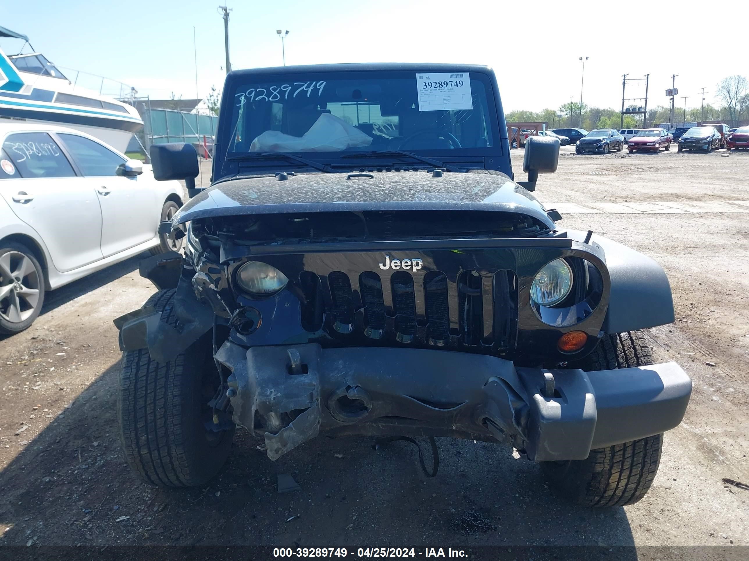 Photo 11 VIN: 1J8GA69119L720583 - JEEP WRANGLER 