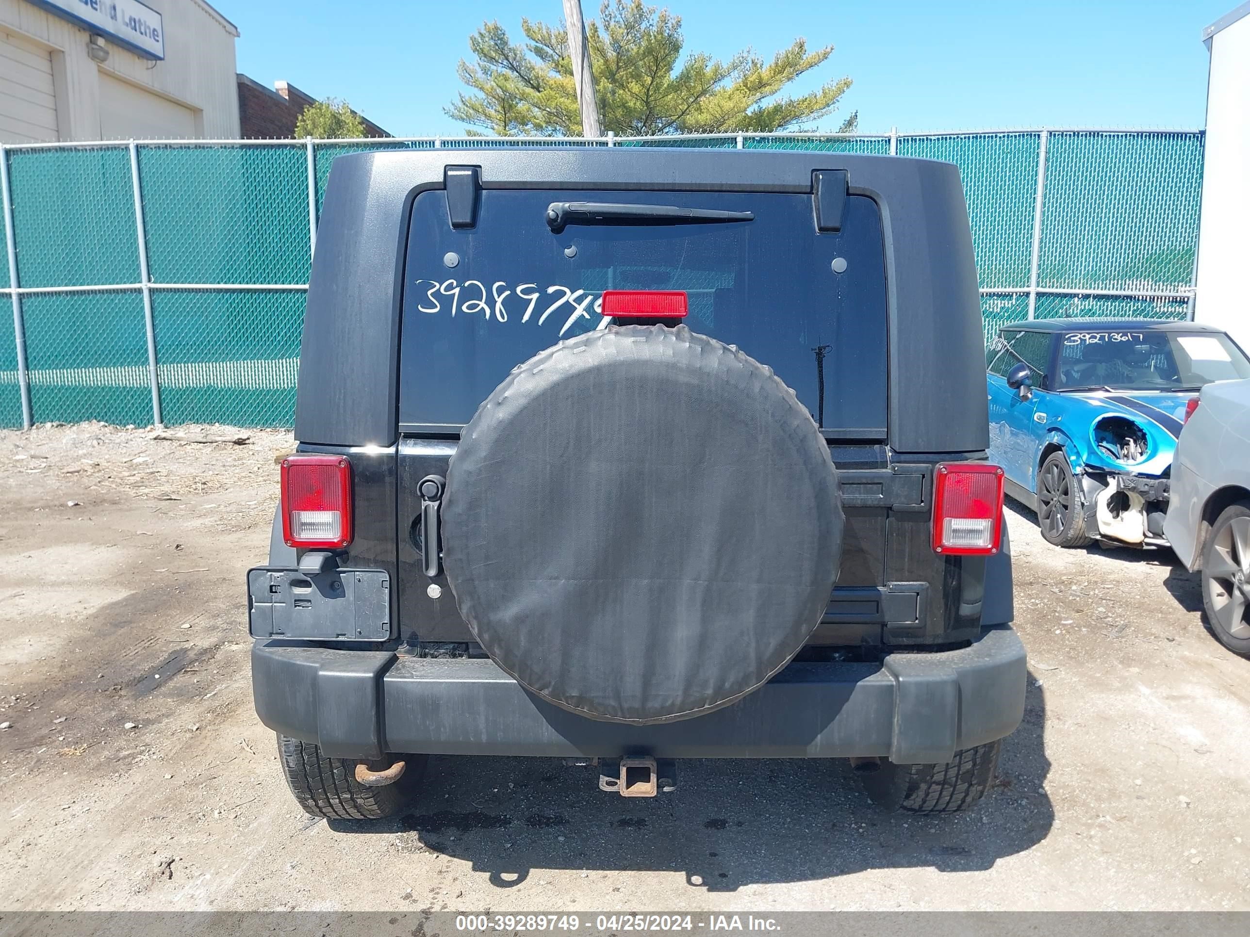 Photo 15 VIN: 1J8GA69119L720583 - JEEP WRANGLER 