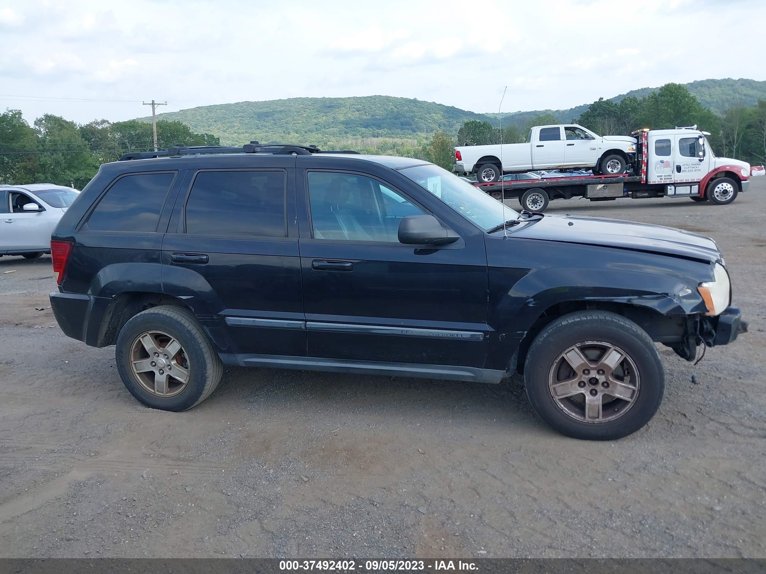 Photo 12 VIN: 1J8GR48KX7C502064 - JEEP GRAND CHEROKEE 