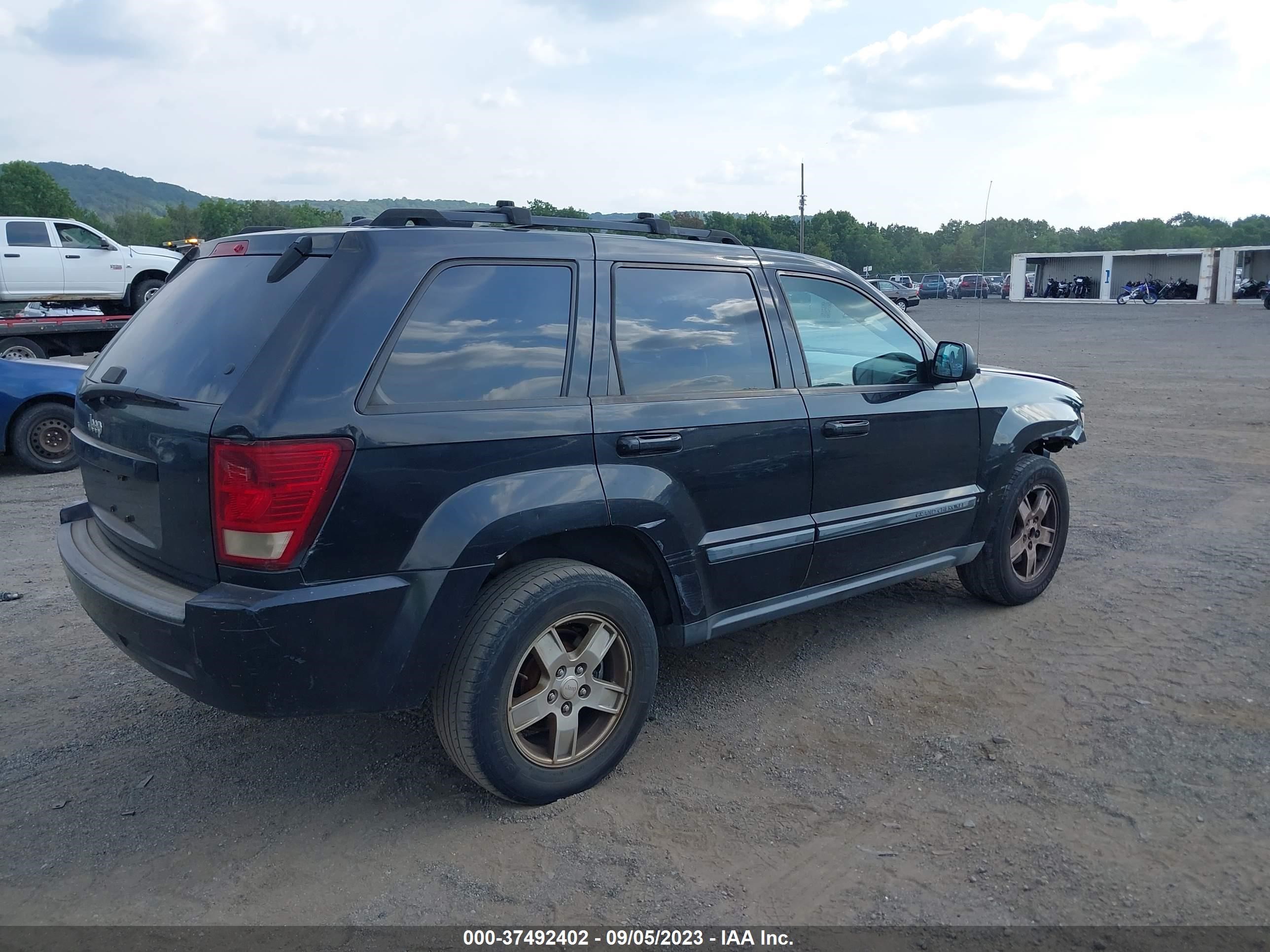 Photo 3 VIN: 1J8GR48KX7C502064 - JEEP GRAND CHEROKEE 