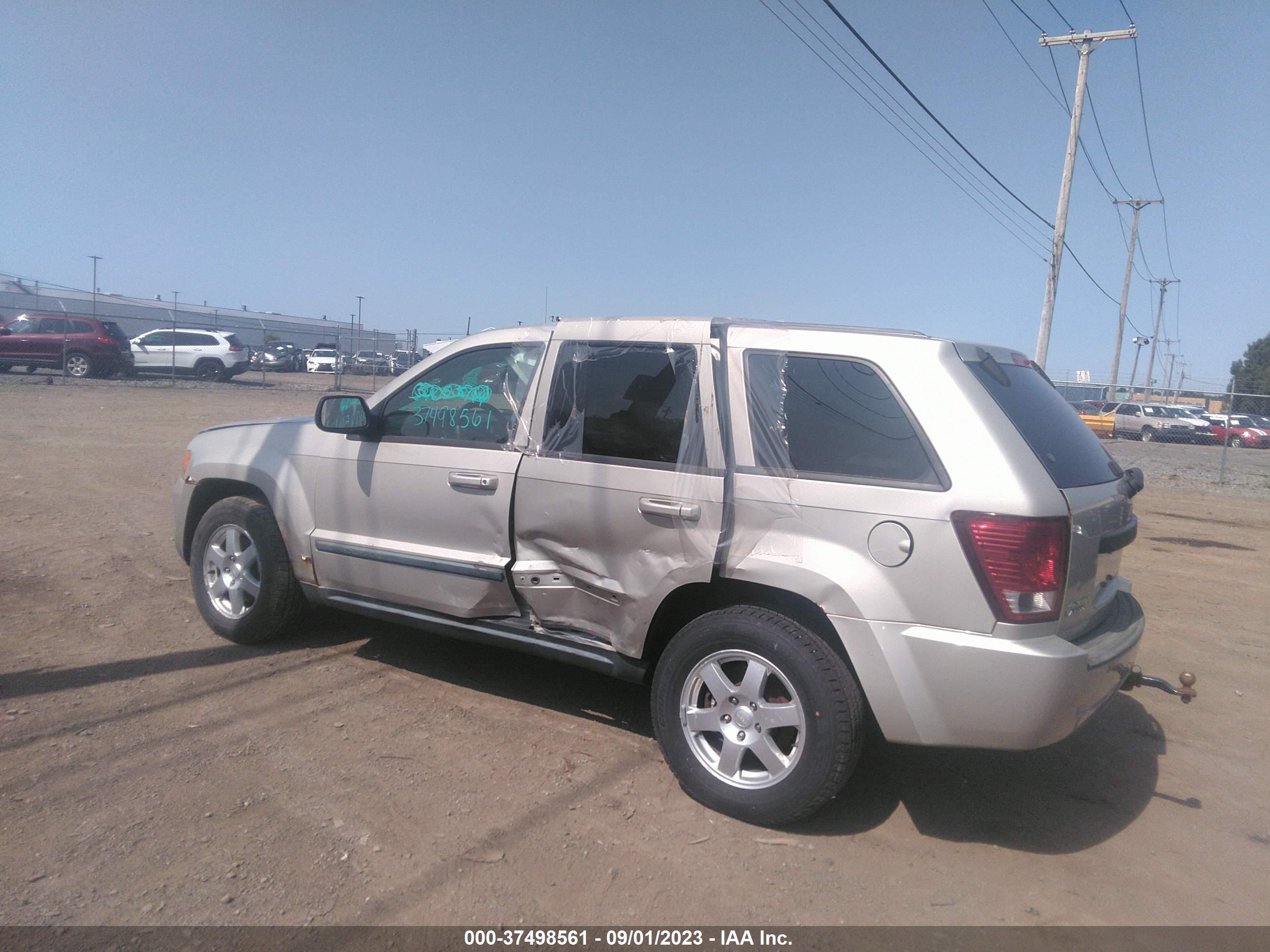 Photo 2 VIN: 1J8GR48KX8C129450 - JEEP GRAND CHEROKEE 