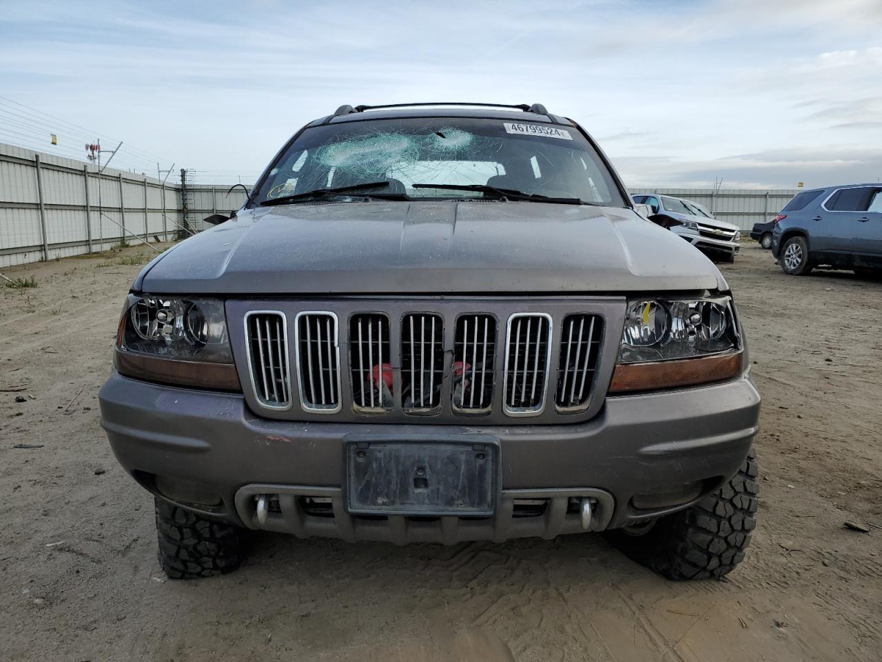 Photo 4 VIN: 1J8GW68J12C114242 - JEEP GRAND CHEROKEE 