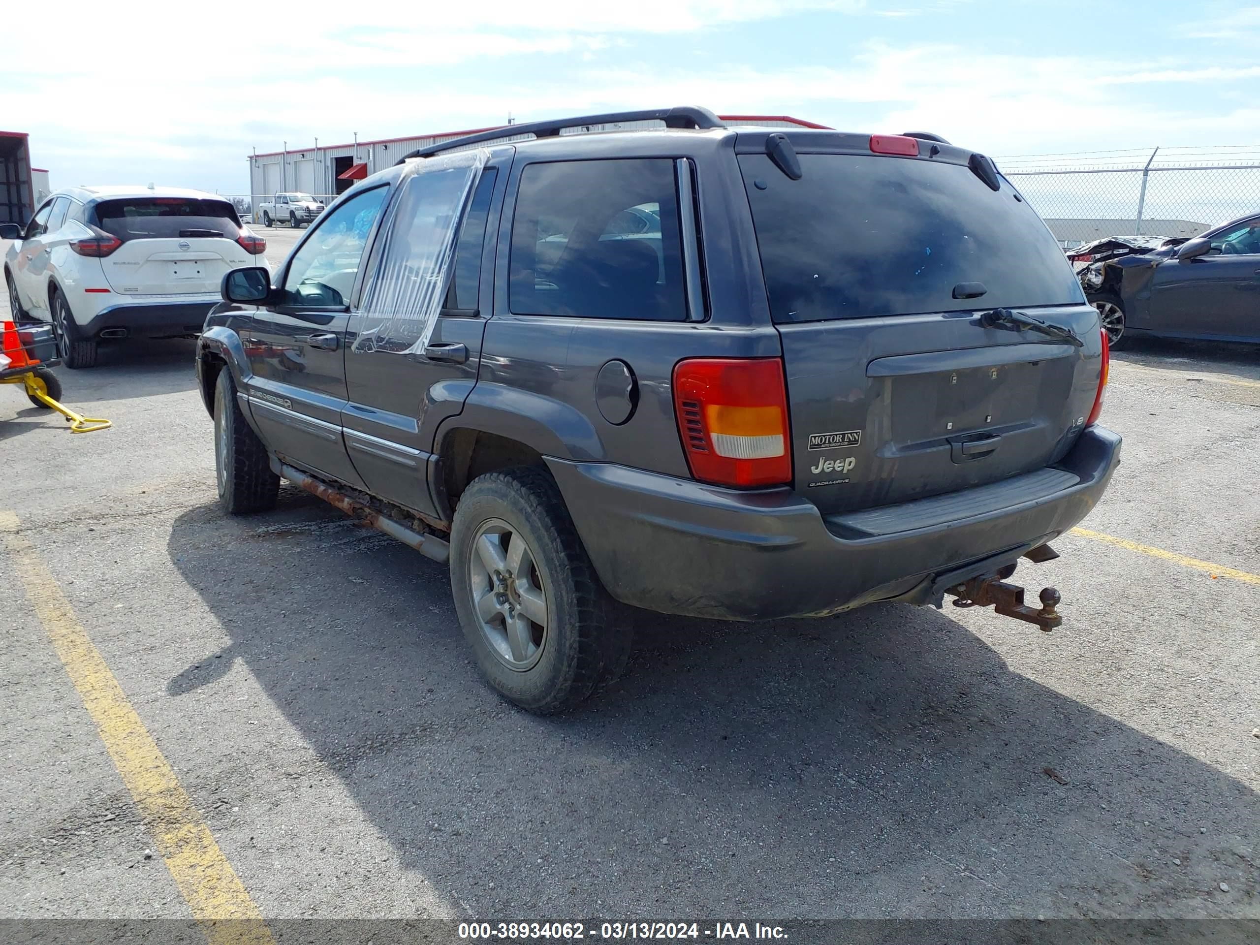 Photo 3 VIN: 1J8GW68J24C208374 - JEEP GRAND CHEROKEE 