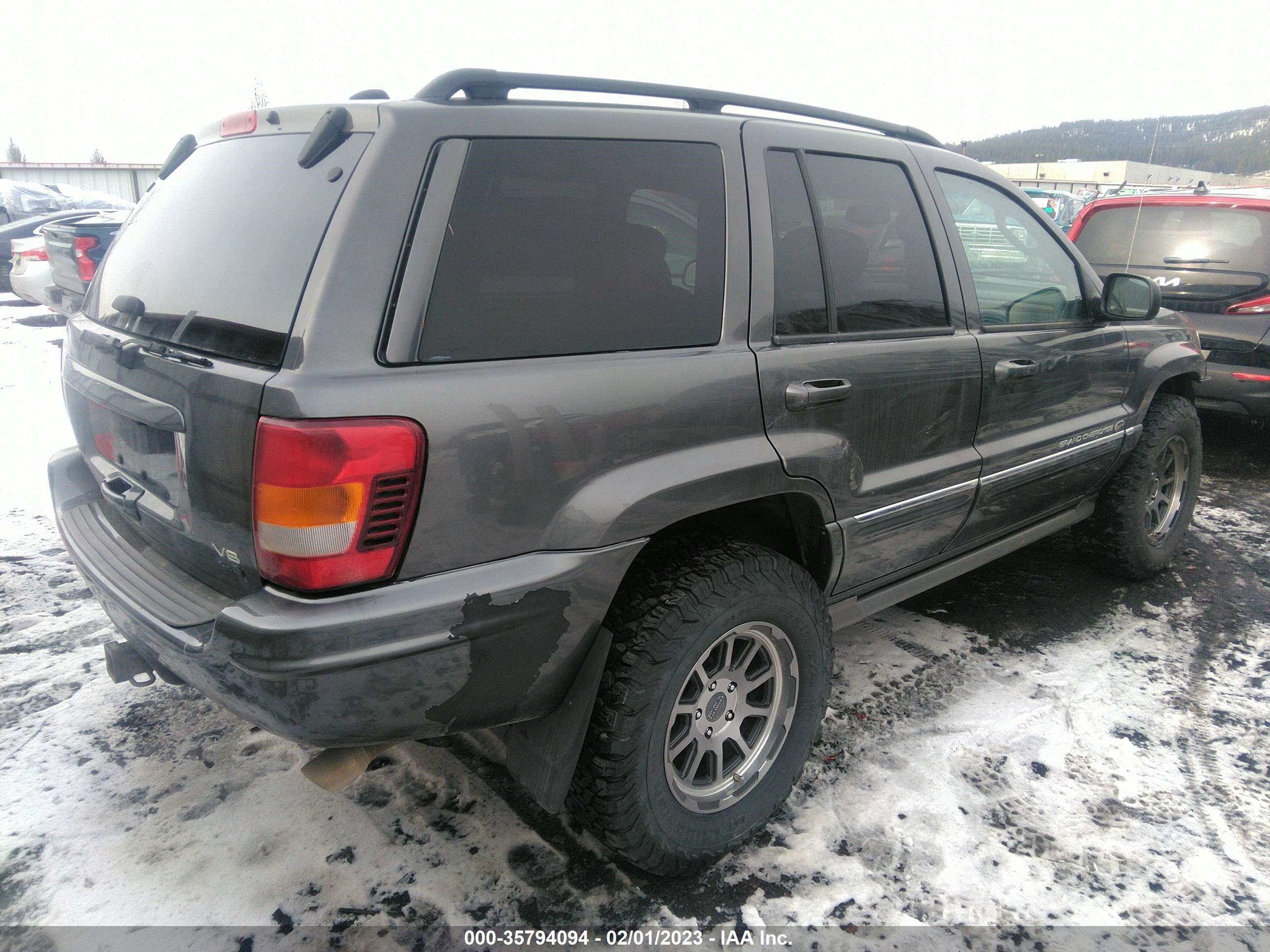 Photo 3 VIN: 1J8GW68J64C331823 - JEEP GRAND CHEROKEE 