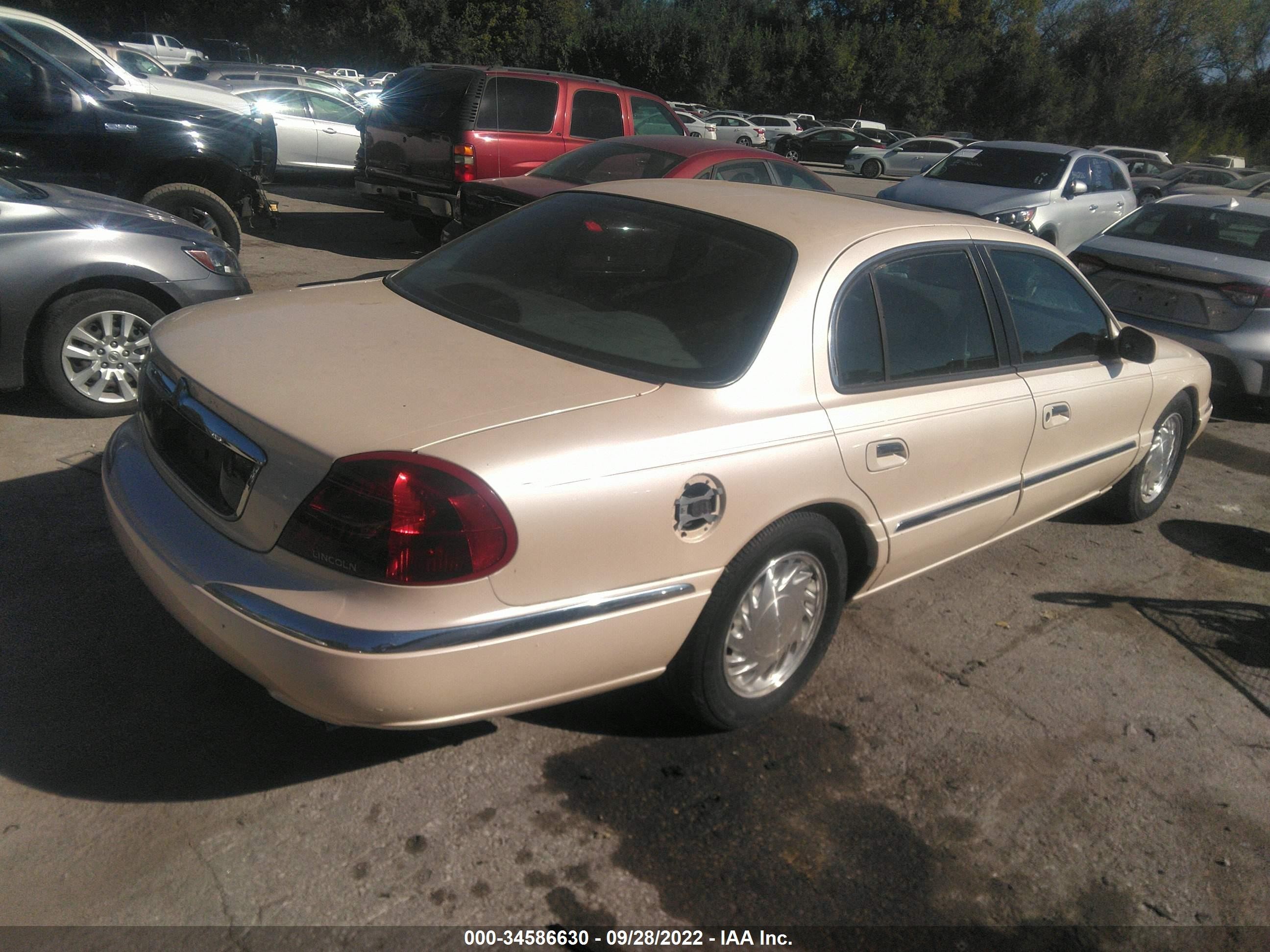 Photo 3 VIN: 1LNFM97V3WY721813 - LINCOLN CONTINENTAL 