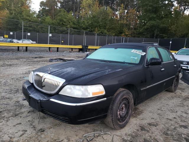 Photo 1 VIN: 1LNHM81W13Y605168 - LINCOLN TOWN CAR E 